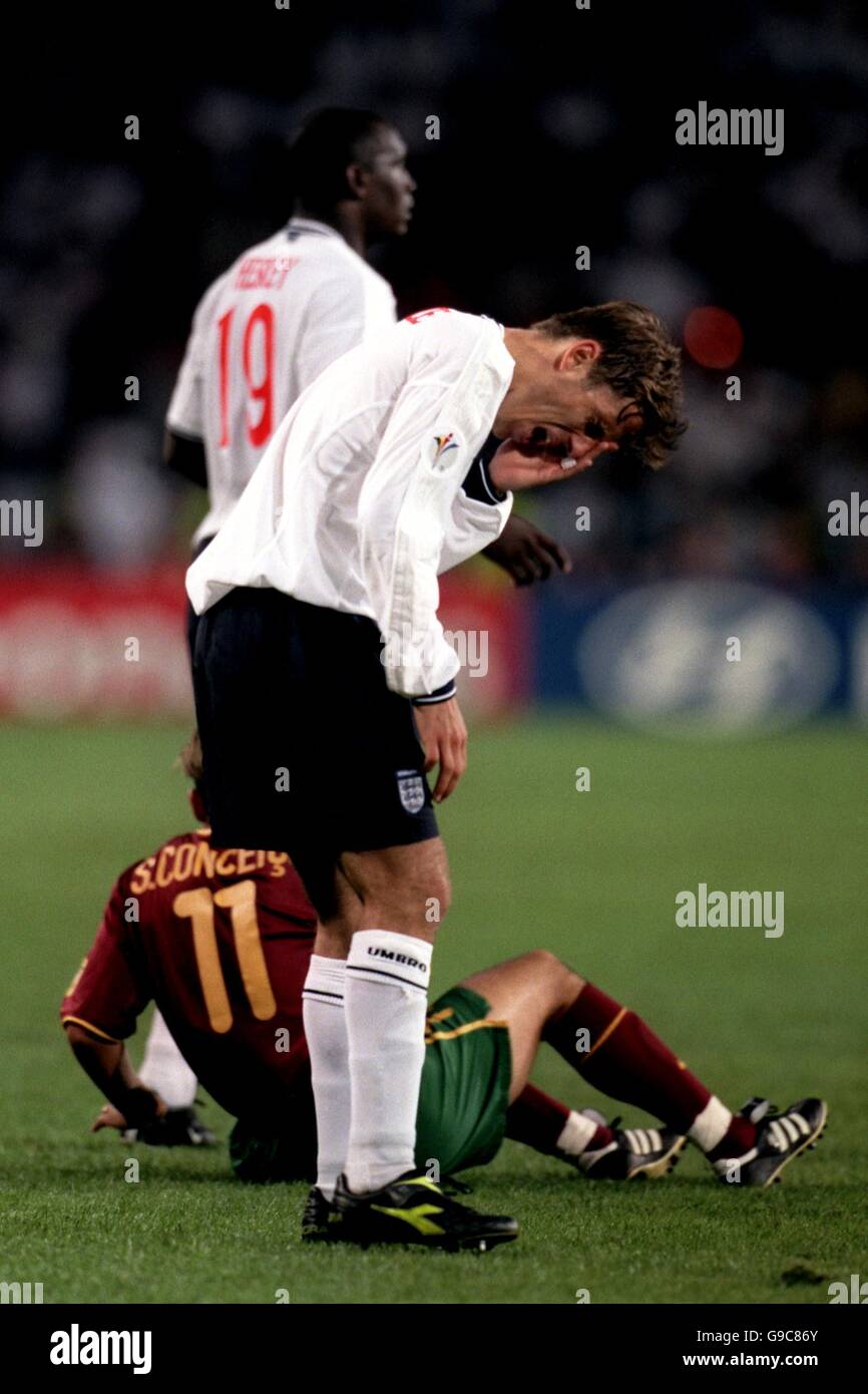 Soccer - Euro 2000 - Group A - Portugal v England. England's Phil Neville is dejected at the end of the game Stock Photo