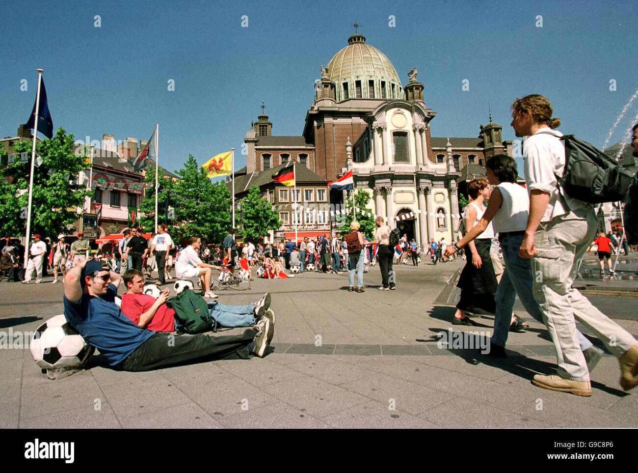 Soccer - Euro 2000 - Group C - Yugoslavia v Slovenia. Yugoslavian and Slovenian fans soak up the pre-match atmosphere in Charleroi's Place Charles II Stock Photo
