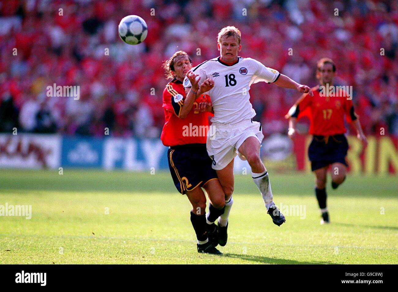 (L-R) Spain's Michel Salgado is brushed aside by Norway's Steffen Iversen in a chase for the ball Stock Photo