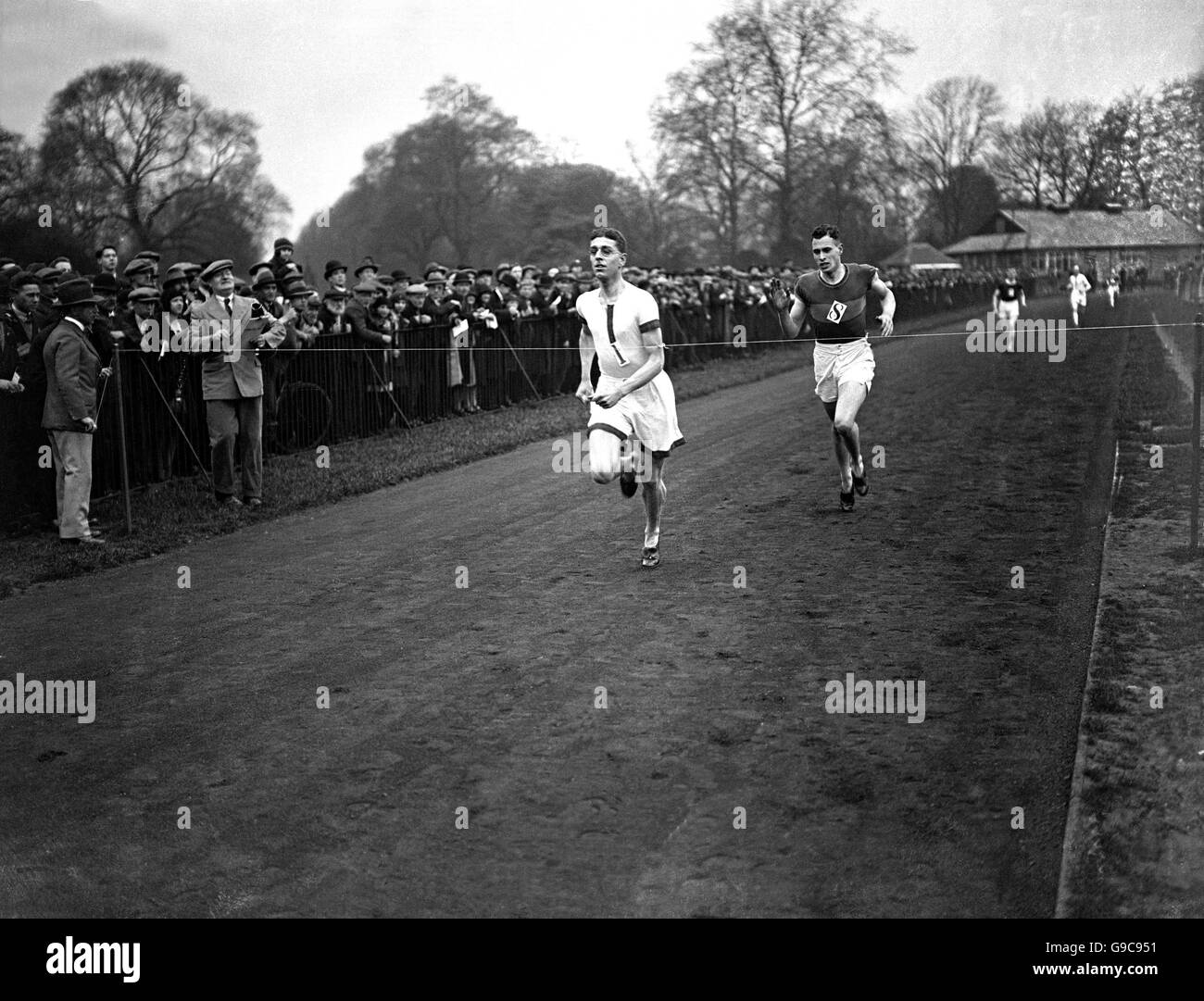 A close finish in the 880 yards match race between Belgrave Harriers and the London Athletic Club in Battersea Park, London, which was won by T Hampsen of London Athletic Club who finished just ahead of JE Tosh of Belgrave Harriers Stock Photo