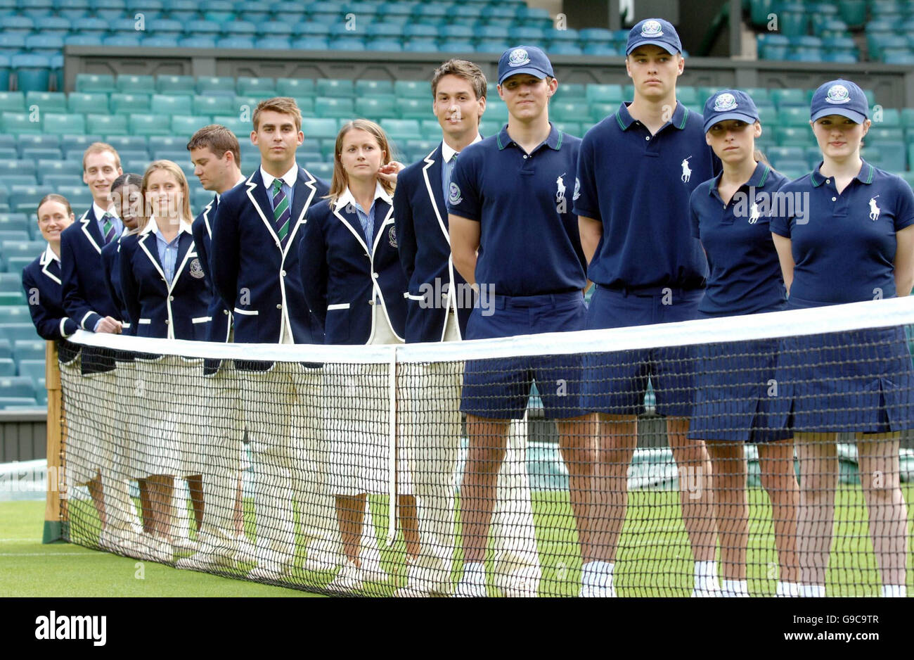 Wimbledon court officials and ball persons model the new polo
