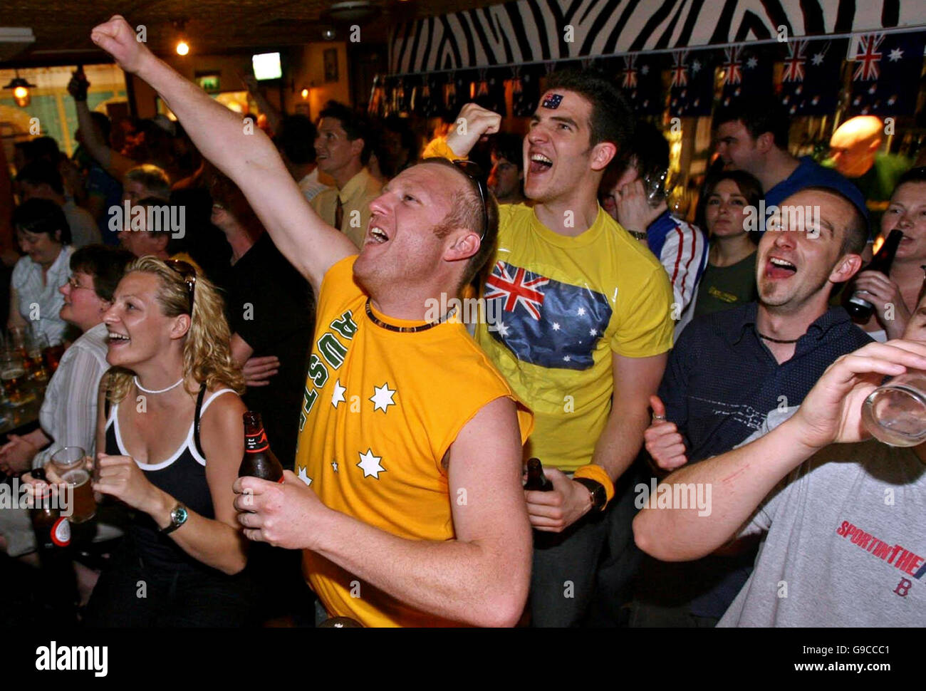 WORLDCUP Australia fans. Austrailian fans cheer on their team against Japan at the Whool Shed Pub in Dublin. Stock Photo