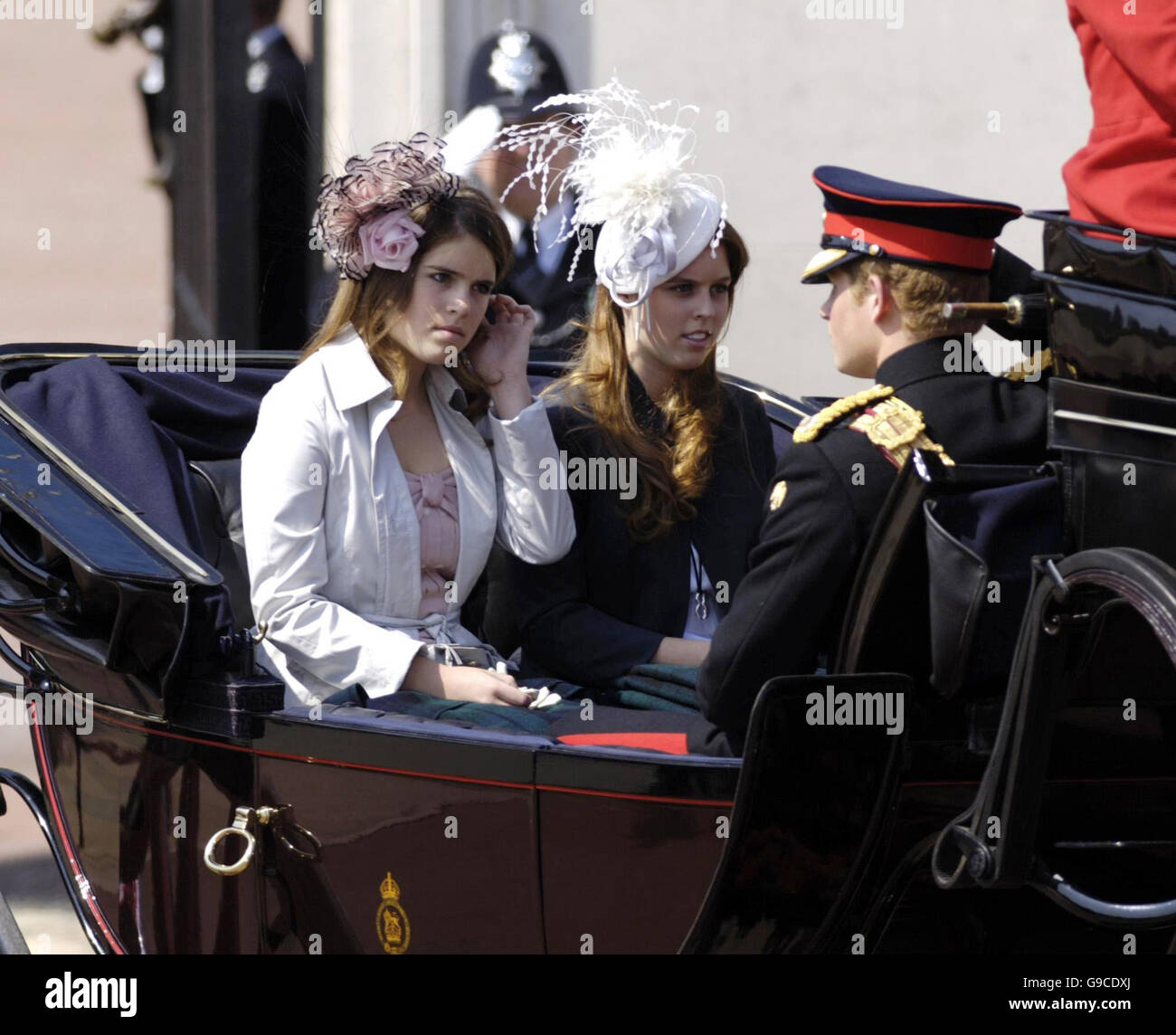 Prince Harry sits in a carriage with the Duke of York and his daughters Princess' Eugenie (left) and Beatrice as they leave Buckingham Palace, London, to watch the annual Trooping the Colour ceremony as Britain's Queen Elizabeth II celebrates her official 80th birthday. PRESS ASSOCIATION Photo, Picture date: Saturday June 17, 2006. More than 1,100 soldiers will take part in the colourful annual display of pomp and pageantry. See PA story ROYAL Queen. Photo credit should read: Andrew Stuart /PA. Stock Photo
