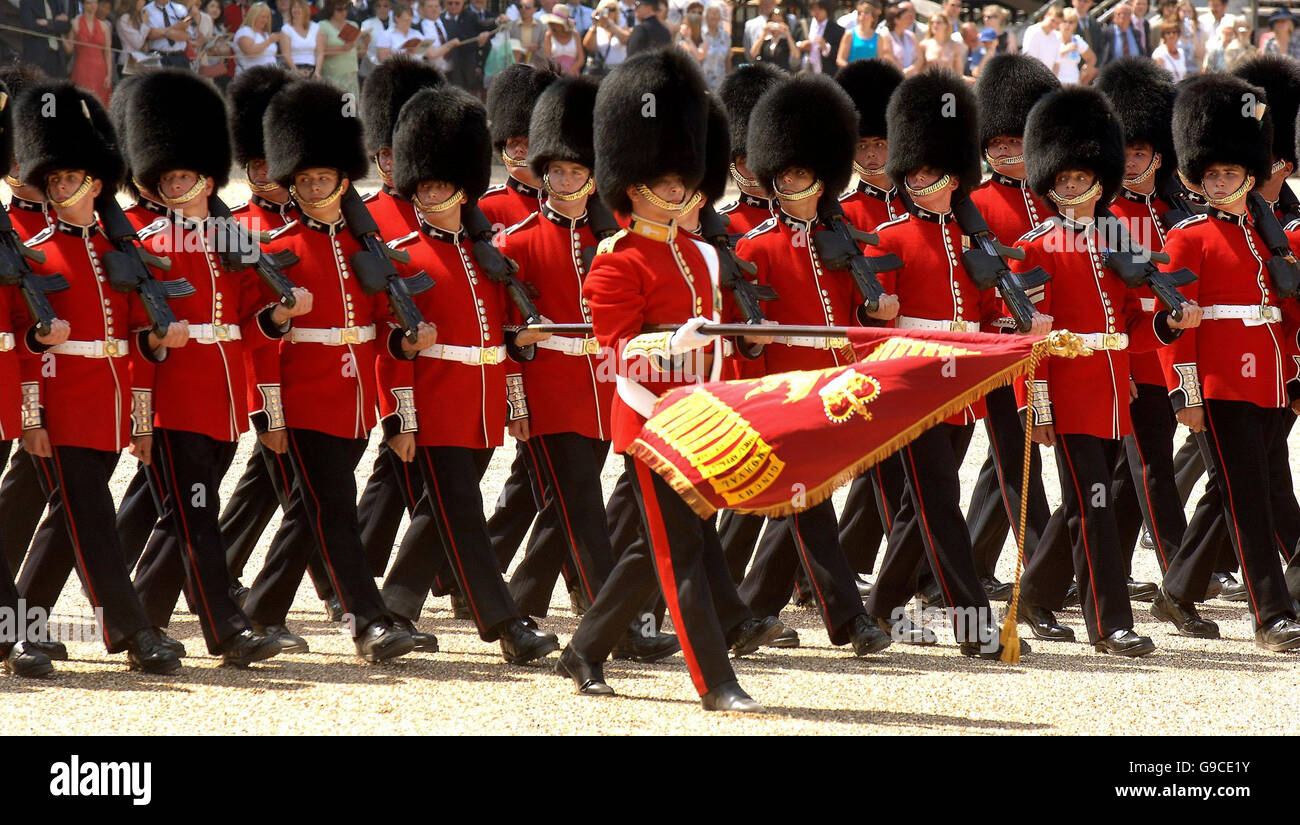 The Colour (flag) is marched past the Queen at the front of the Welsh Guards, during the Trooping the Colour Ceremony, on Horse Guards parade ground in Central London. PRESS ASSOCIATION Photo, Picture date: Saturday June 17, 2006. More than 1,100 soldiers will take part in the colourful annual display of pomp and pageantry. See PA story ROYAL Queen. Photo credit should read: John Stillwell/PA. Stock Photo