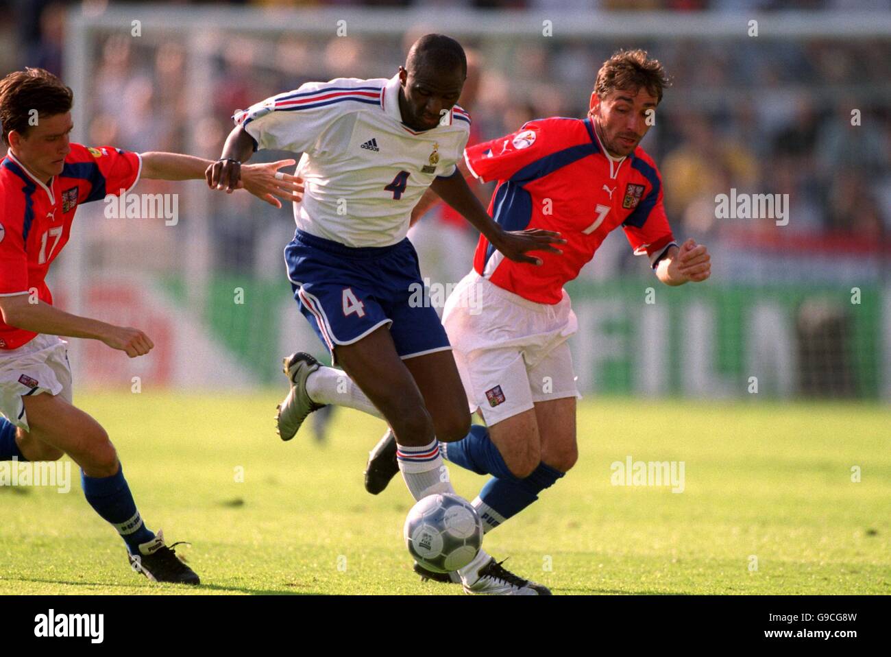 France's Patrick Vieira (c) is put under pressure by the Czech Republic's Vladimir Smicer (l) and Jiri Nemec (r) Stock Photo