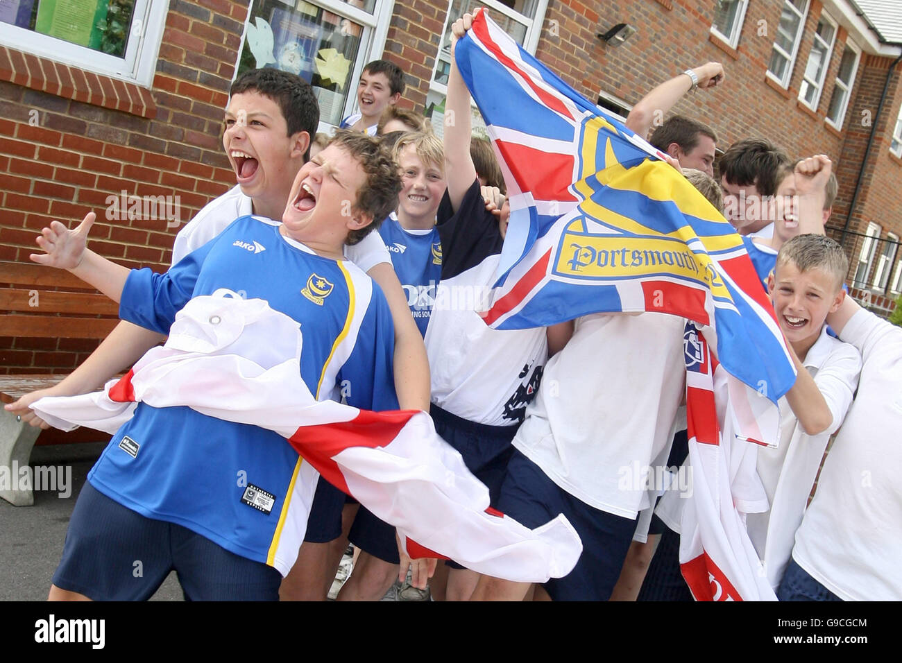 School children from Mayville High School in Portsmouth celebrate after