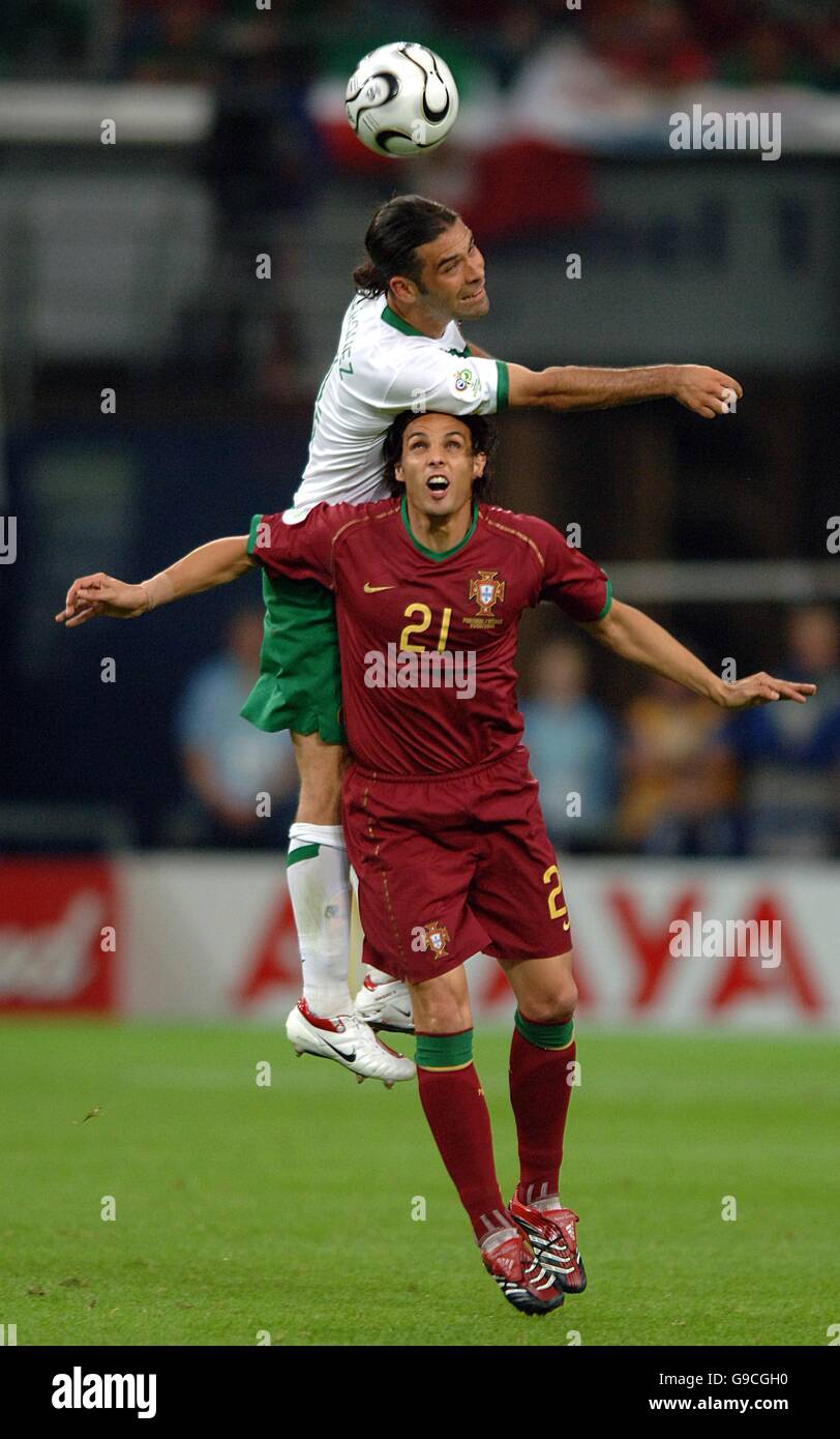 Soccer - 2006 FIFA World Cup Germany - Group D - Portugal v Mexico - AufSchalke Arena. Mexico's Rafael Marquez gets above Portugal's Nuno Gomes Stock Photo