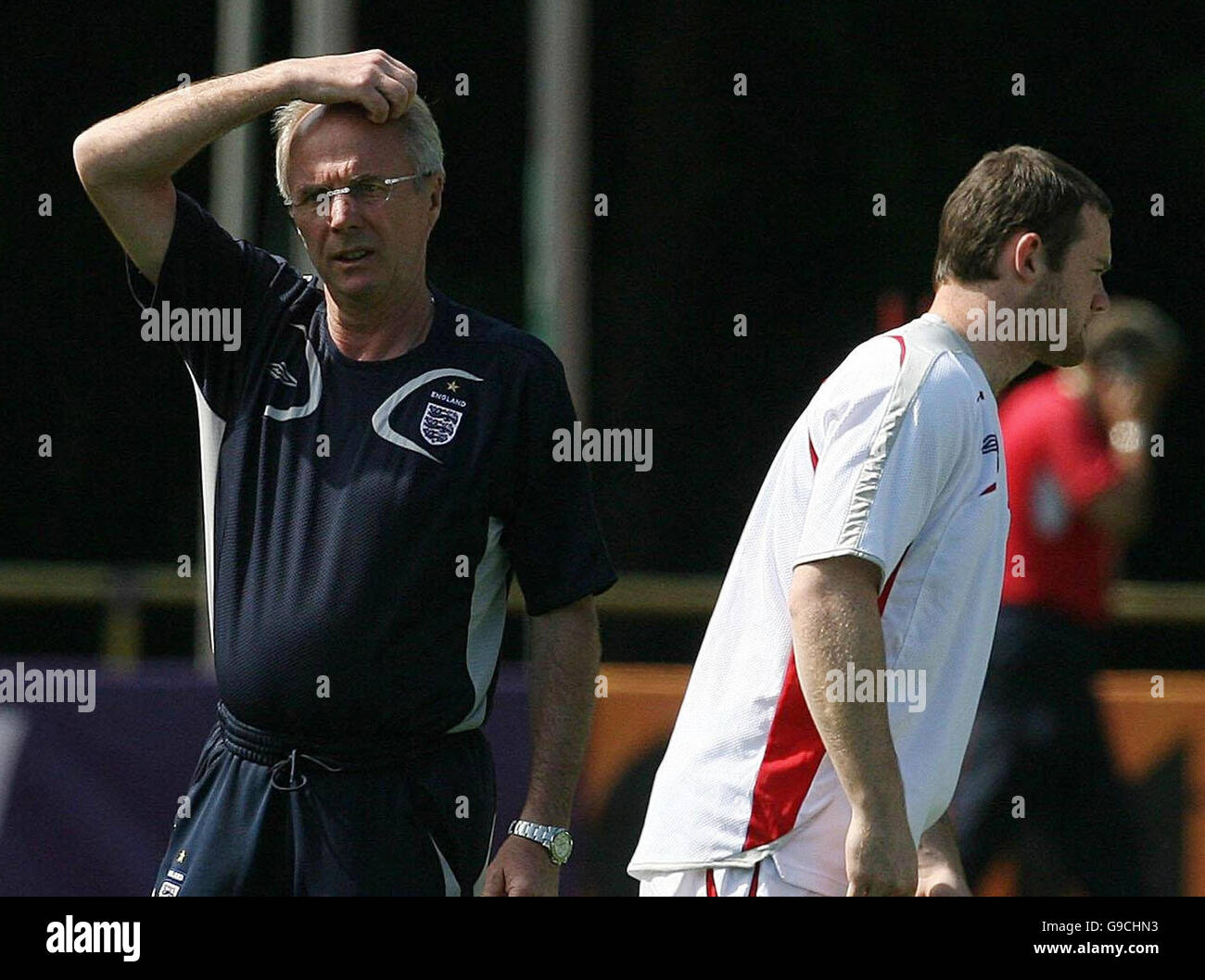 England head coach Sven Goran Eriksson (left) and Wayne Rooney during a ...