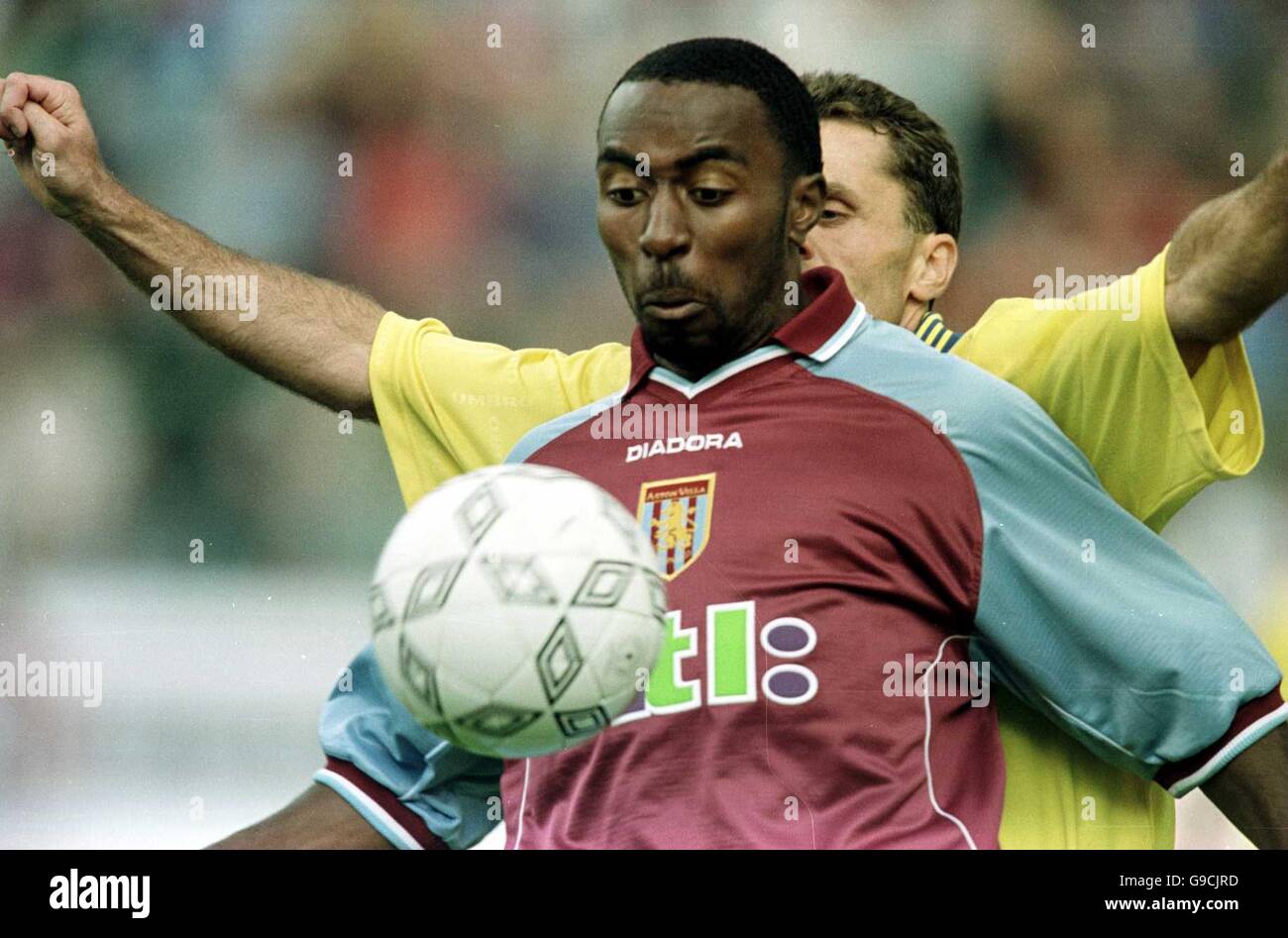 Aston Villa's Darius Vassell (front) shields the ball from Marila Pribram's Marcel Macha (hidden) Stock Photo