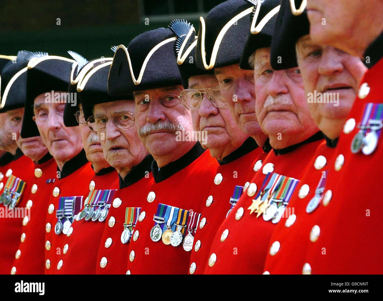 Chelsea pensioners prepare to march along King's Road towards Chelsea town hall in Chelsea, west London. Stock Photo