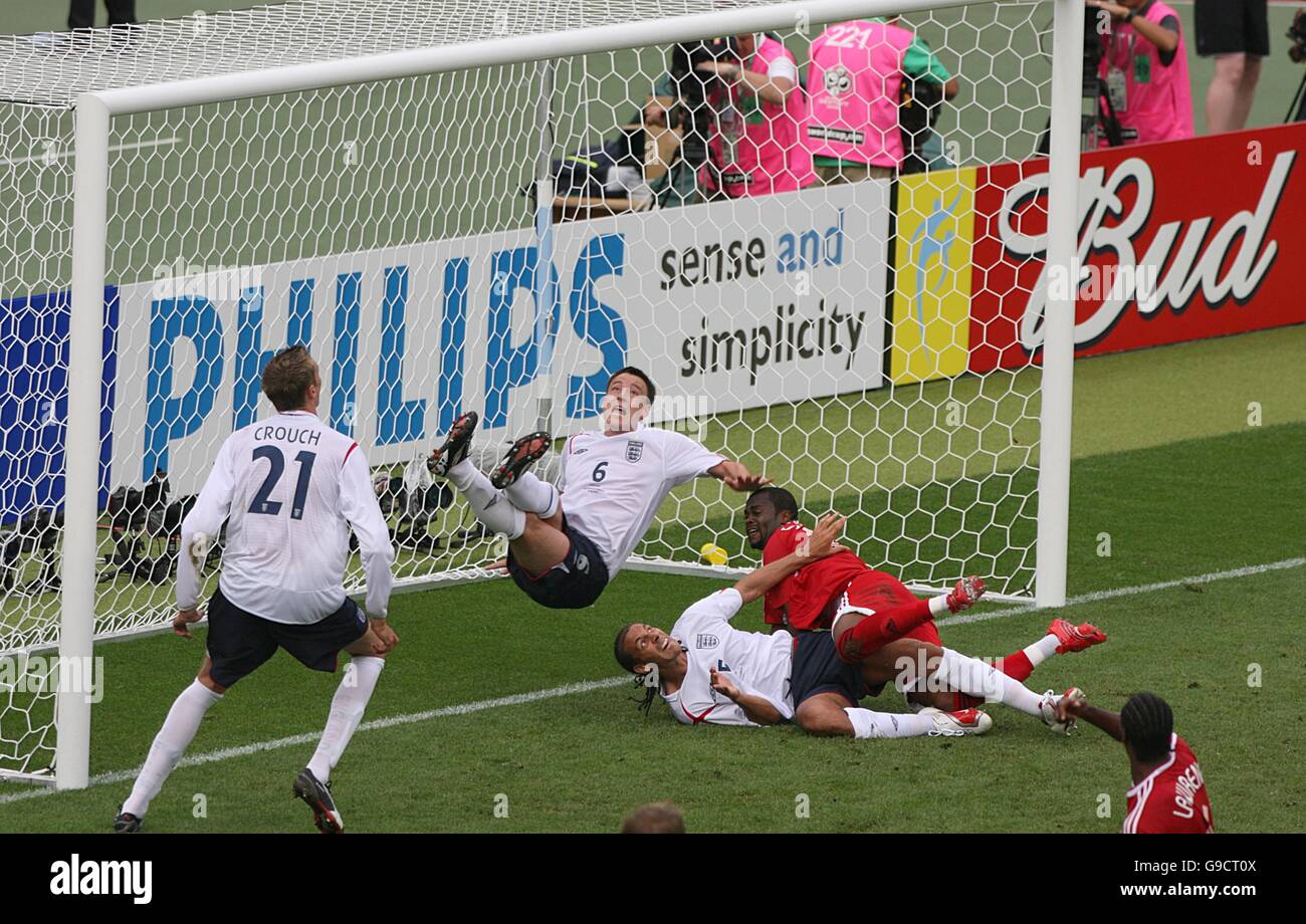 Soccer - 2006 FIFA World Cup Germany - Group B - England v Trinidad & Tobago - Franken-Stadion. England's John Terry clears the ball off the line Stock Photo