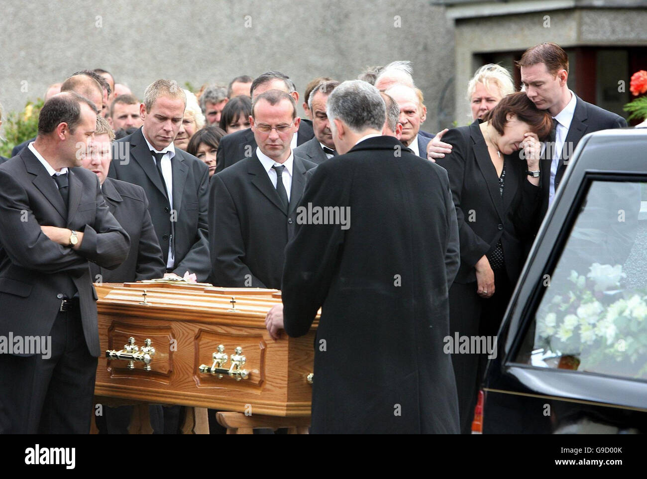 The family of Annie McCartan carry her coffin into St Peter's Church in Warrenpoint, Co Down The family of Annie McCartan carry her coffin into St Peter's Church in Warrenpoint, Co Down