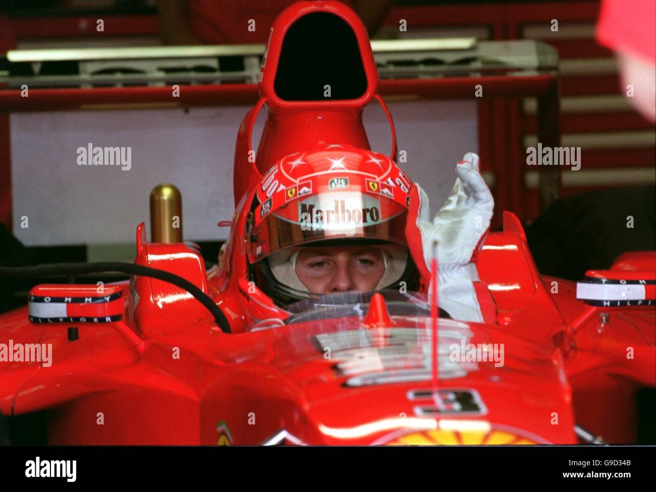 Michael schumacher gives the signal to start his car hi-res stock