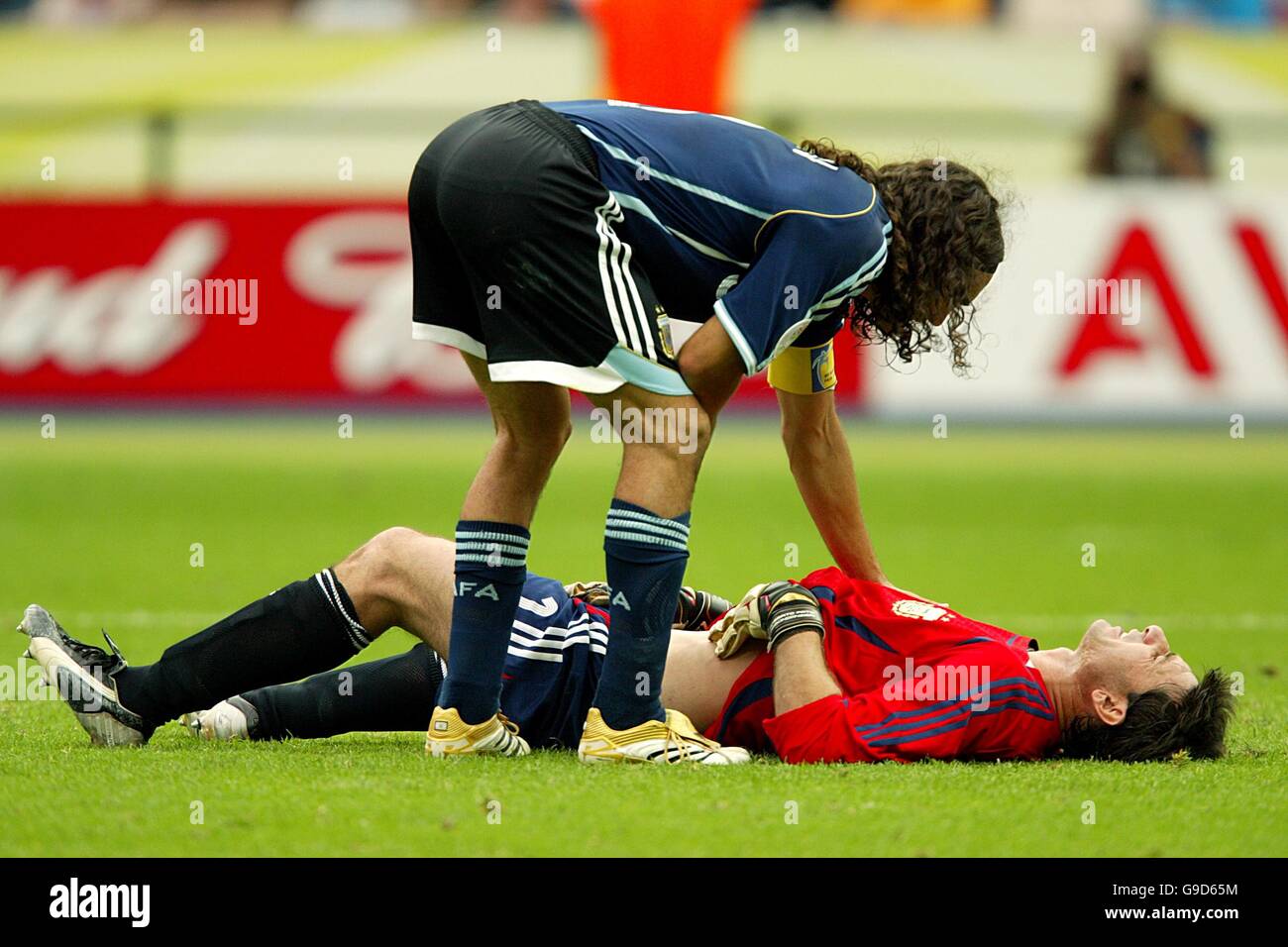 Argentina goalkeeper Roberto Abbondanzieri lies injured prior to be substituted Stock Photo