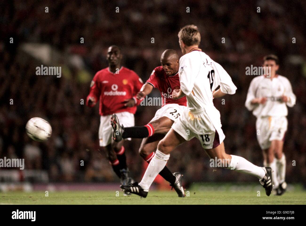 Manchester United's Quinton Fortune (c) strikes his second goal against ...