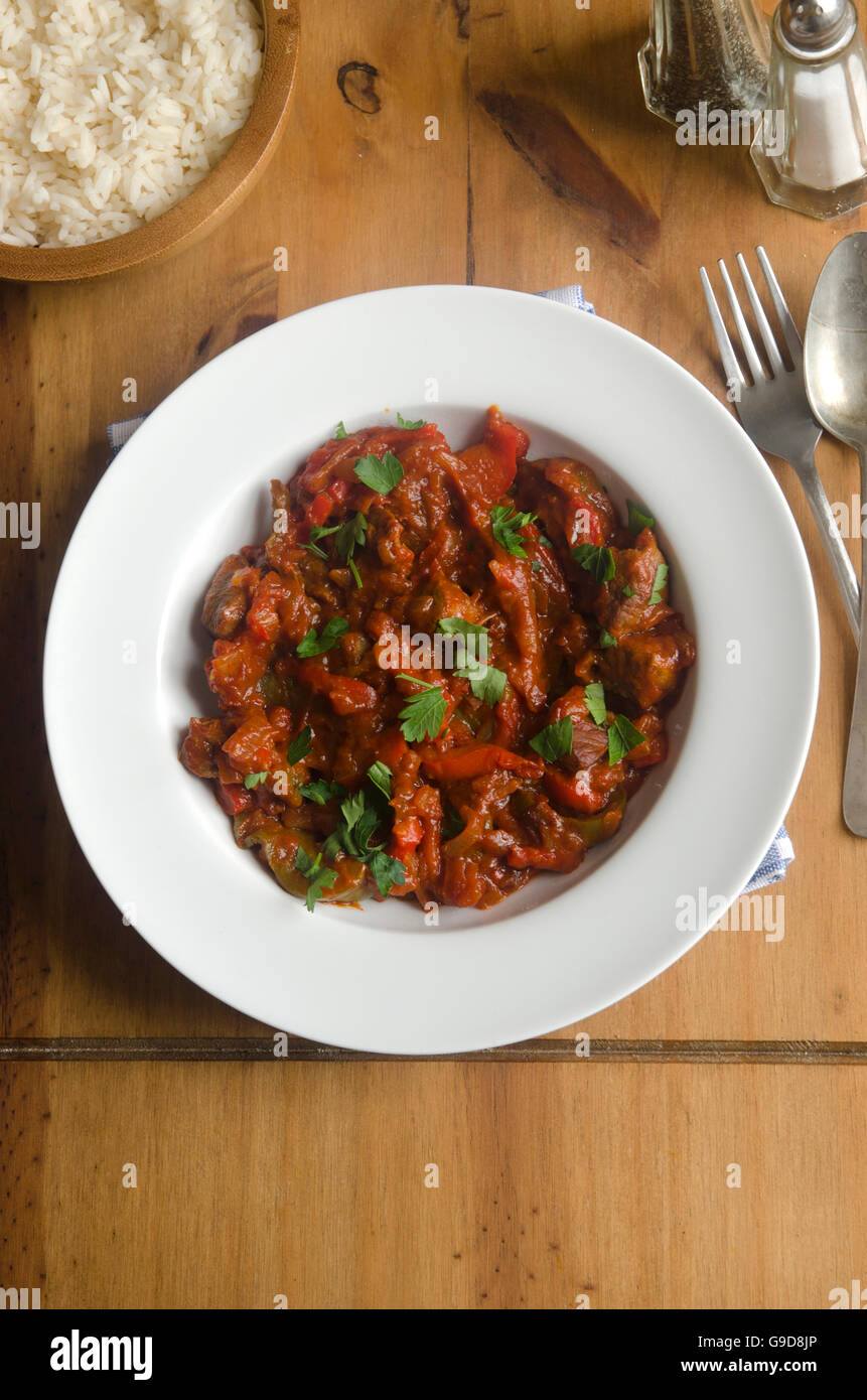 Paprika beef stew with rice Stock Photo Alamy