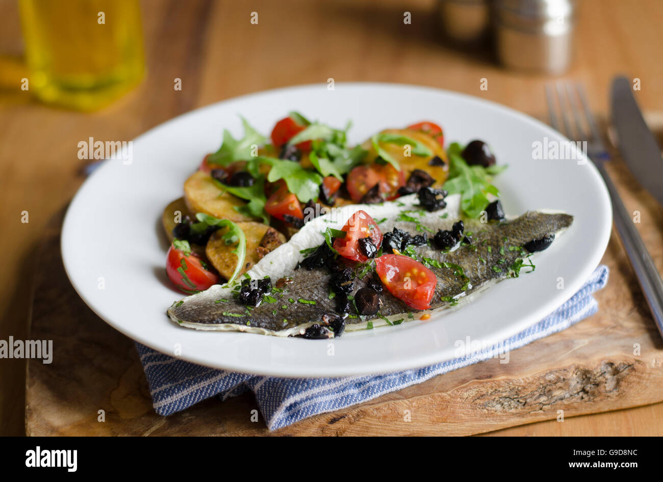 Panseared sea bass with salsa Stock Photo Alamy