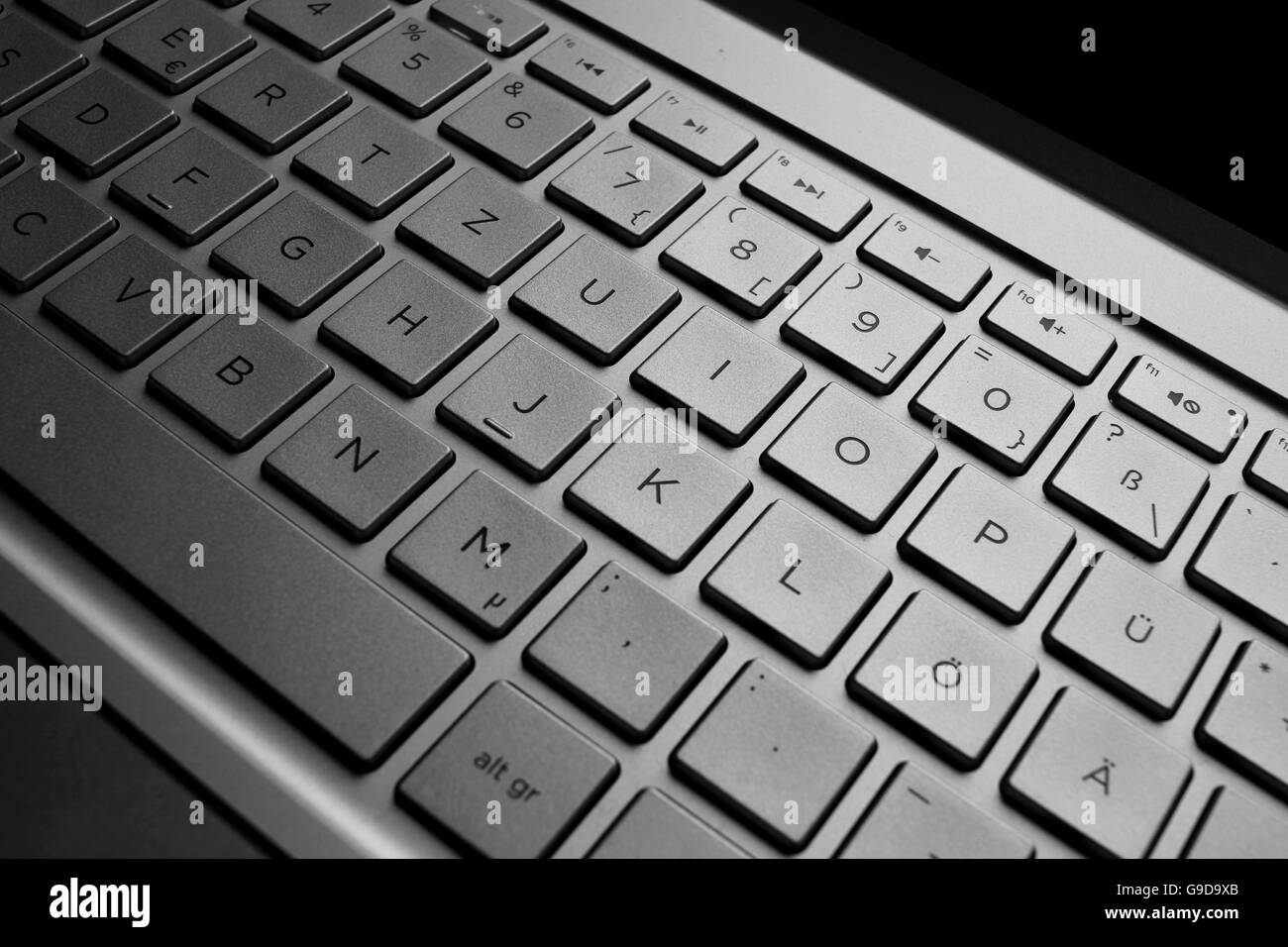 German silver notebook QWERTZ keybord. Stock Photo