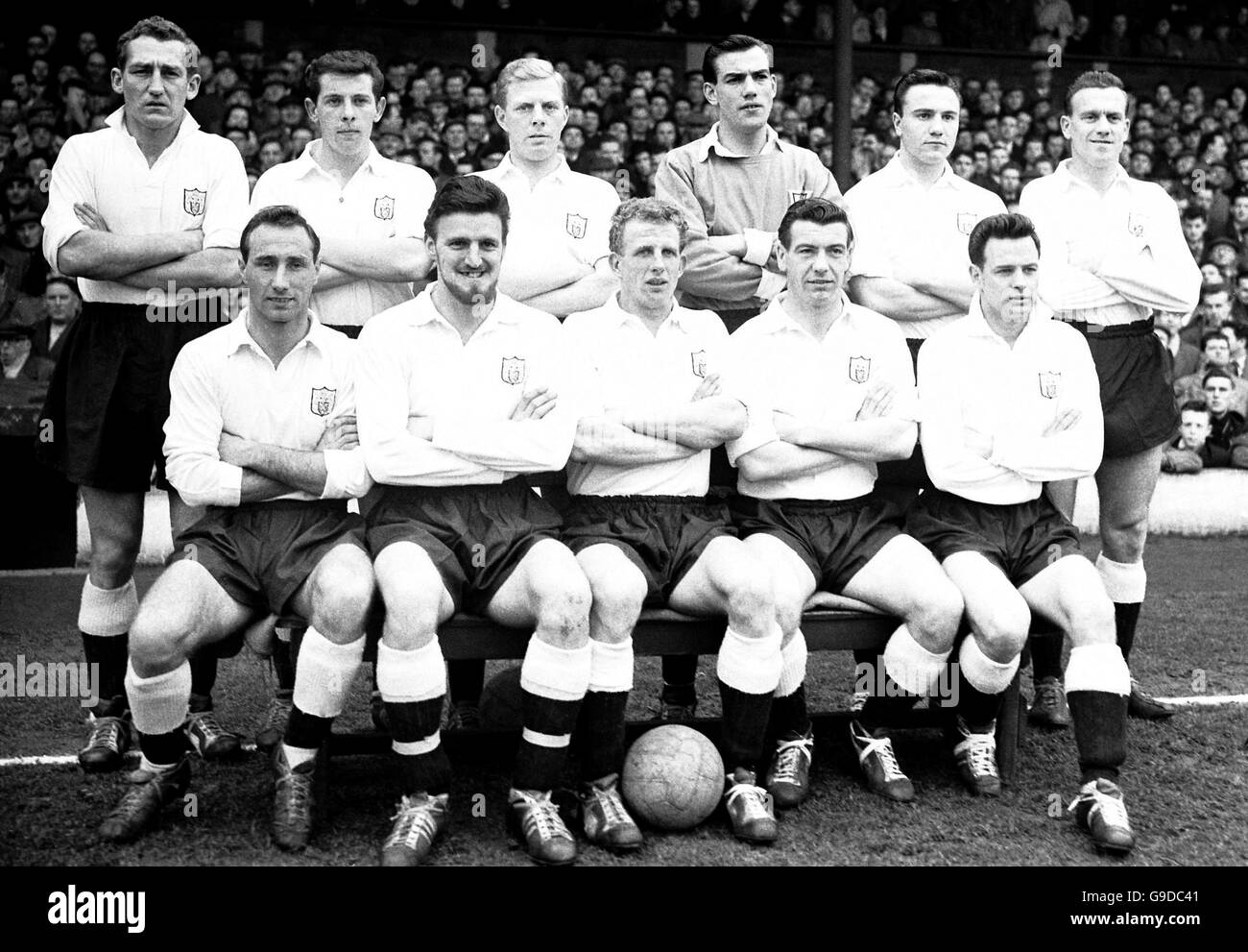A team phot of Fulham Football Club, battling for promotion to the First Division. Left to right: Back row - Bentley, Alan Mullery, Lawler, Macedo, Cohen, and Langley. Front row - Barton, Jimmy Hill, Cook, Haynes and Leggat. Stock Photo