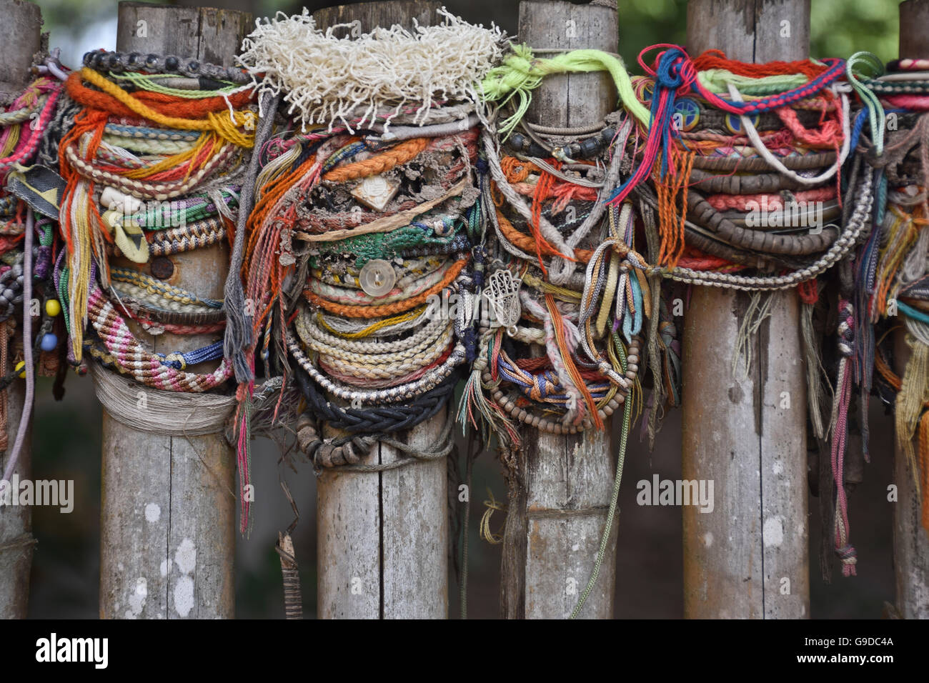 Bracelets left in memory of the victims of genocide at the killing fields in Cambodia. Stock Photo