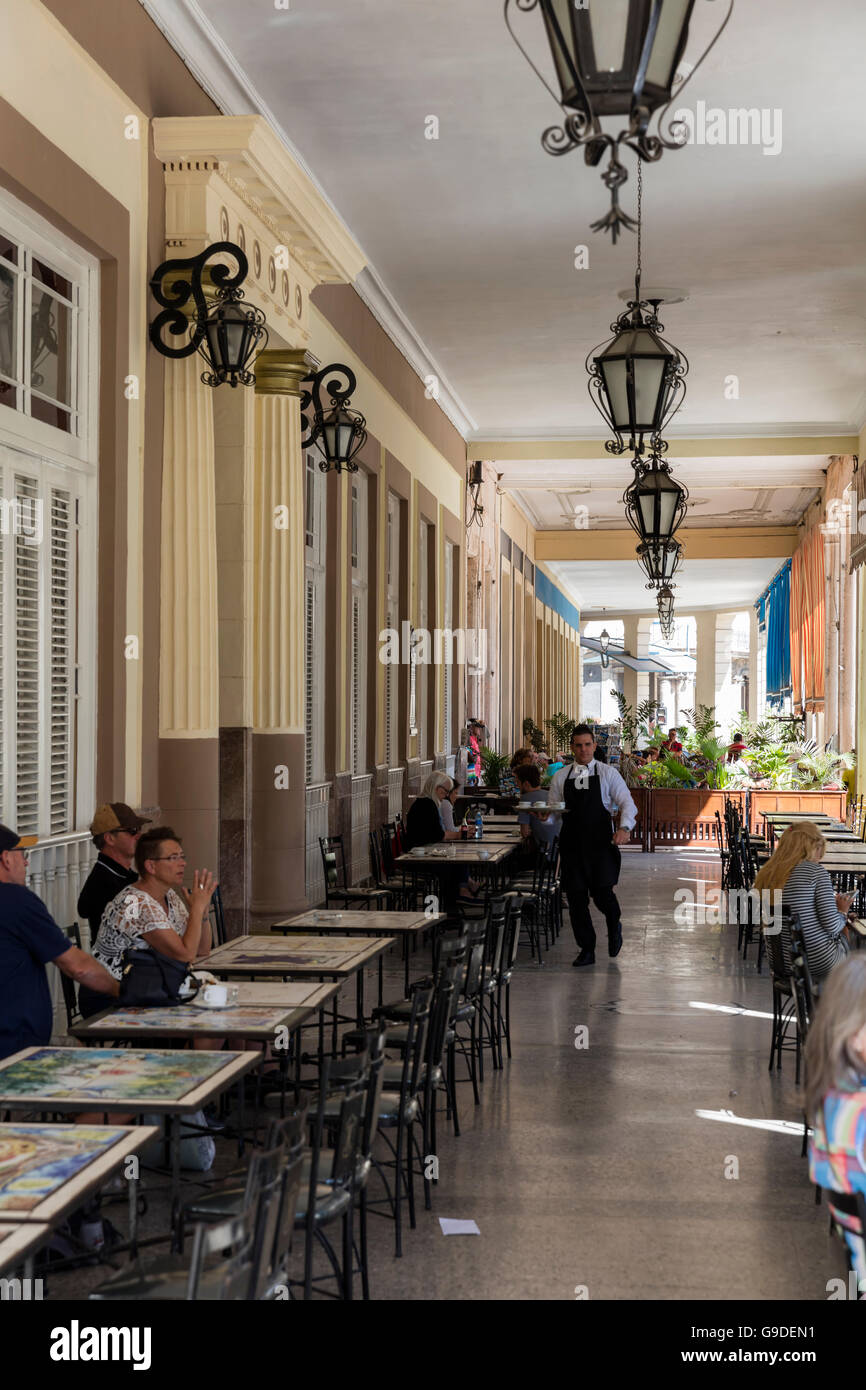 The Louvre sidewalk, la acera del Louvre, a sidewalk cafe in the ground floor of Hotel Inglaterra, Havana, Cuba Stock Photo