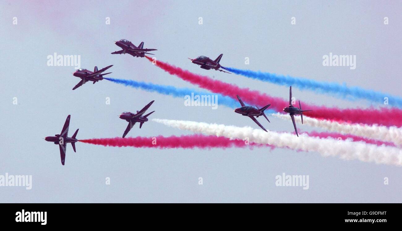 The Red Arrows fly in formation during a display at the Farnborough International Airshow in Hampshire. Stock Photo