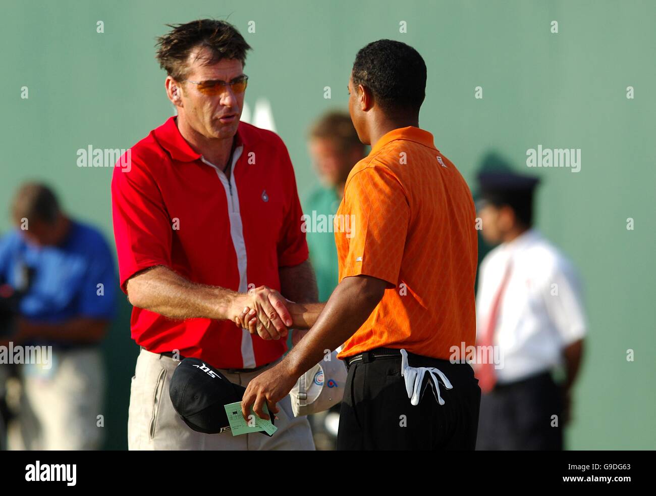 NIck Faldo, England, and Tiger Woods, USA, shake hands after the days play  Stock Photo - Alamy