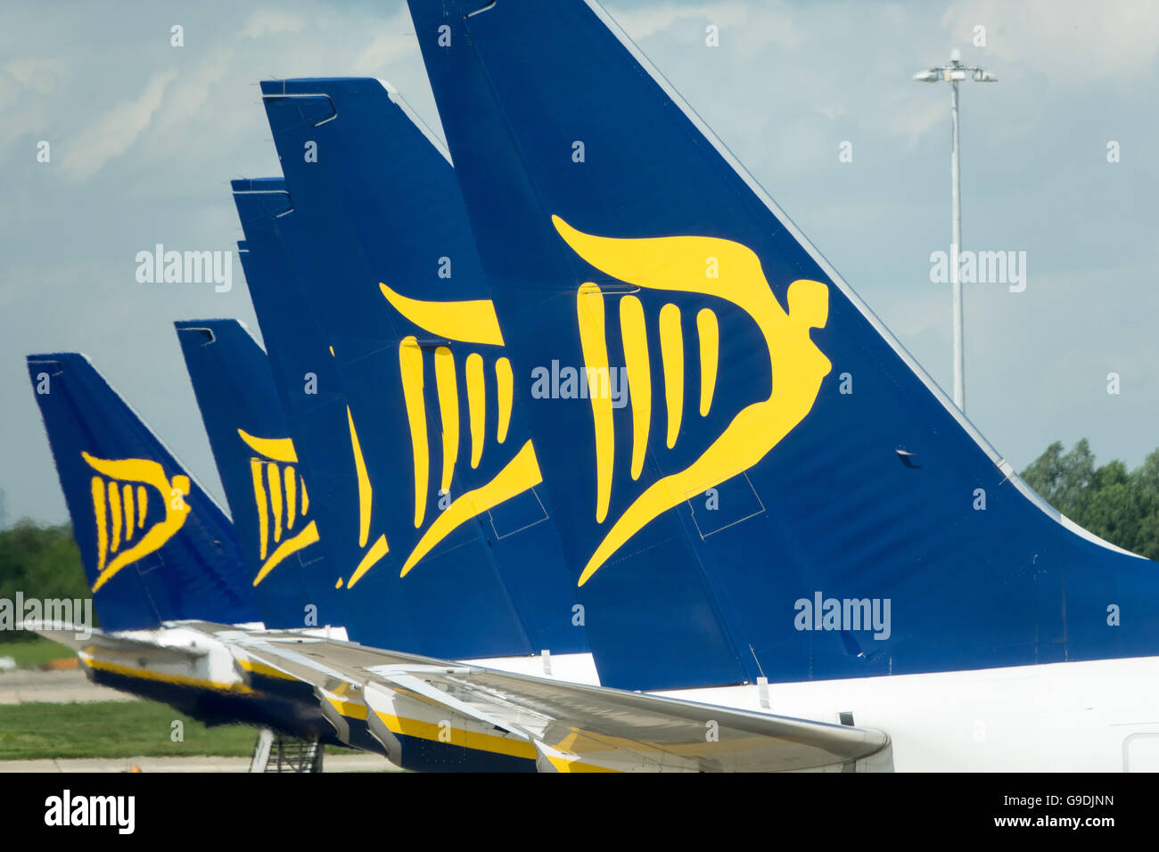 Passengers boarding a Ryanair plane at Stansted airport Essex Stock Photo