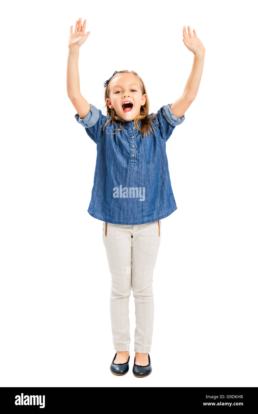 Studio portrait of a happy girl with arms raised on air Stock Photo