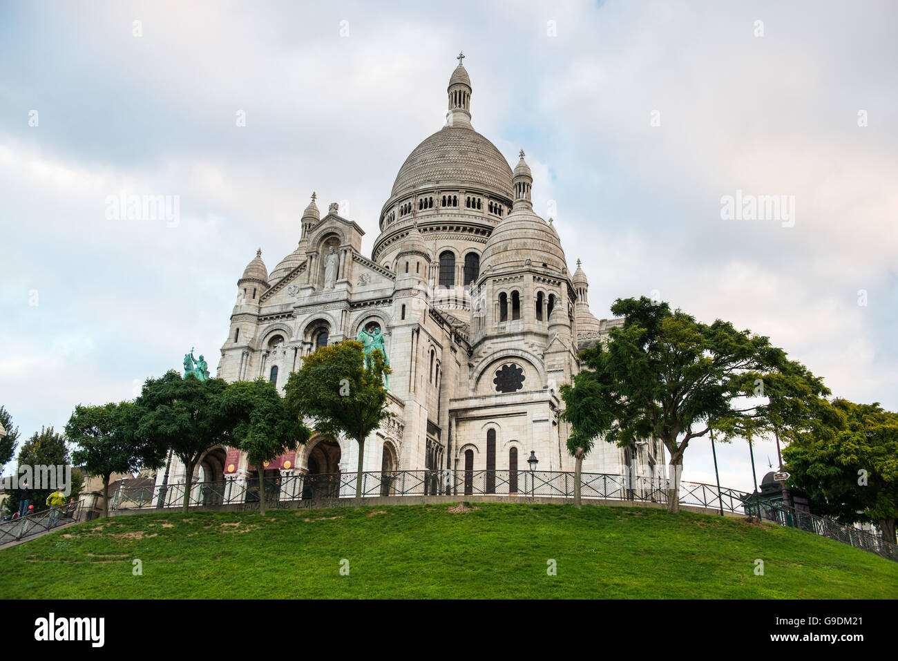 Sacre-Coeur Basilica early in the morning at first sunlight . Stock Photo