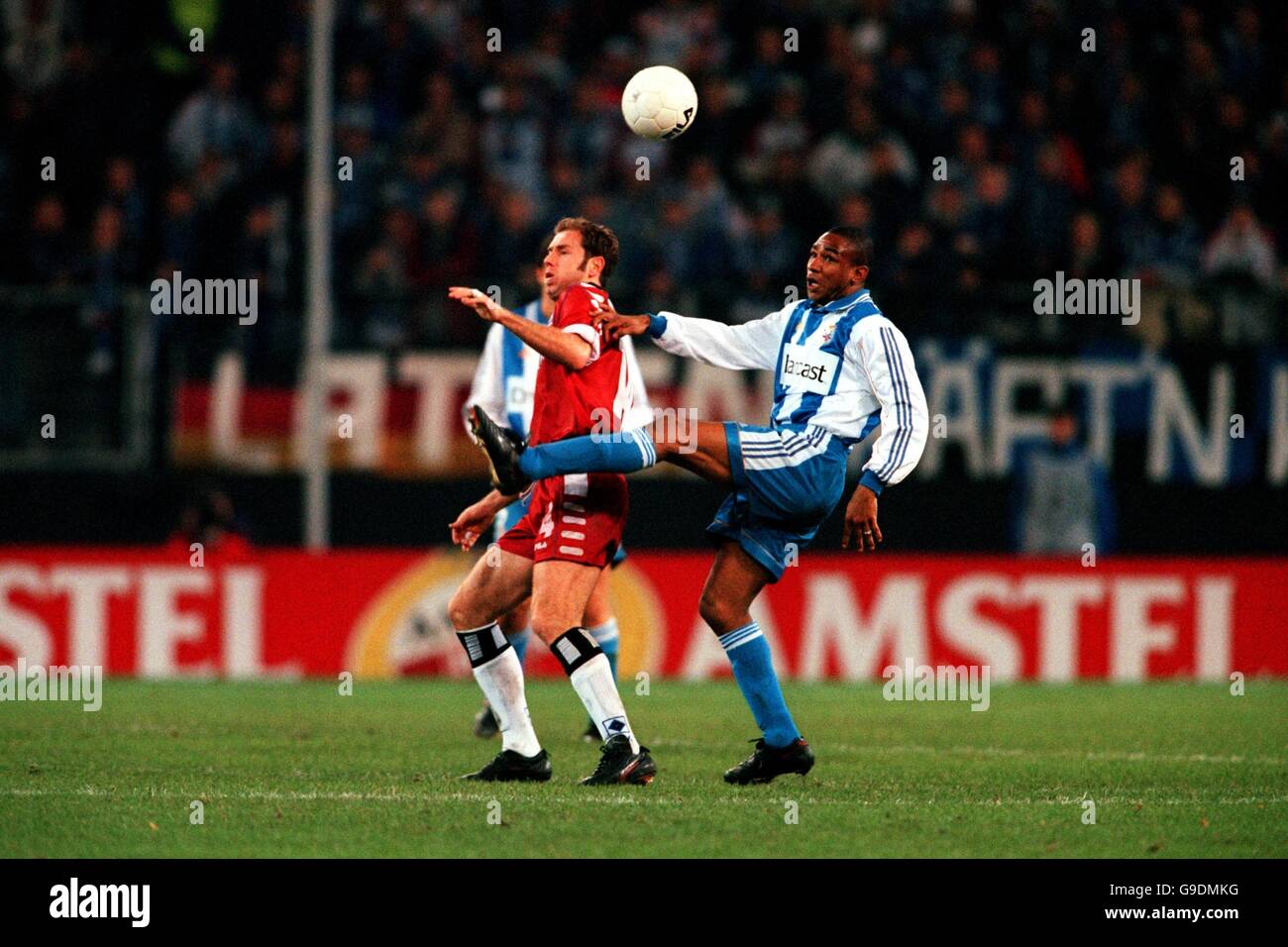 Soccer - UEFA Champions League - Group E - SV Hamburg v Deportivo La Coruna. Deportivo La Coruna's Cesar Sampaio (r) hooks the ball away from SV Hamburg's Sergej Barbarez (l) Stock Photo