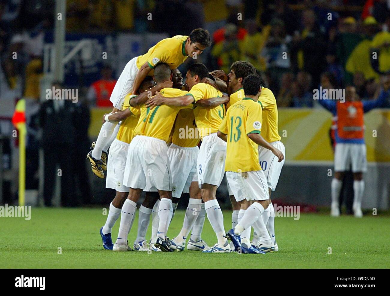 Brazil's Da Silva Gilberto celebrates with team mates after scoring the third goal Stock Photo
