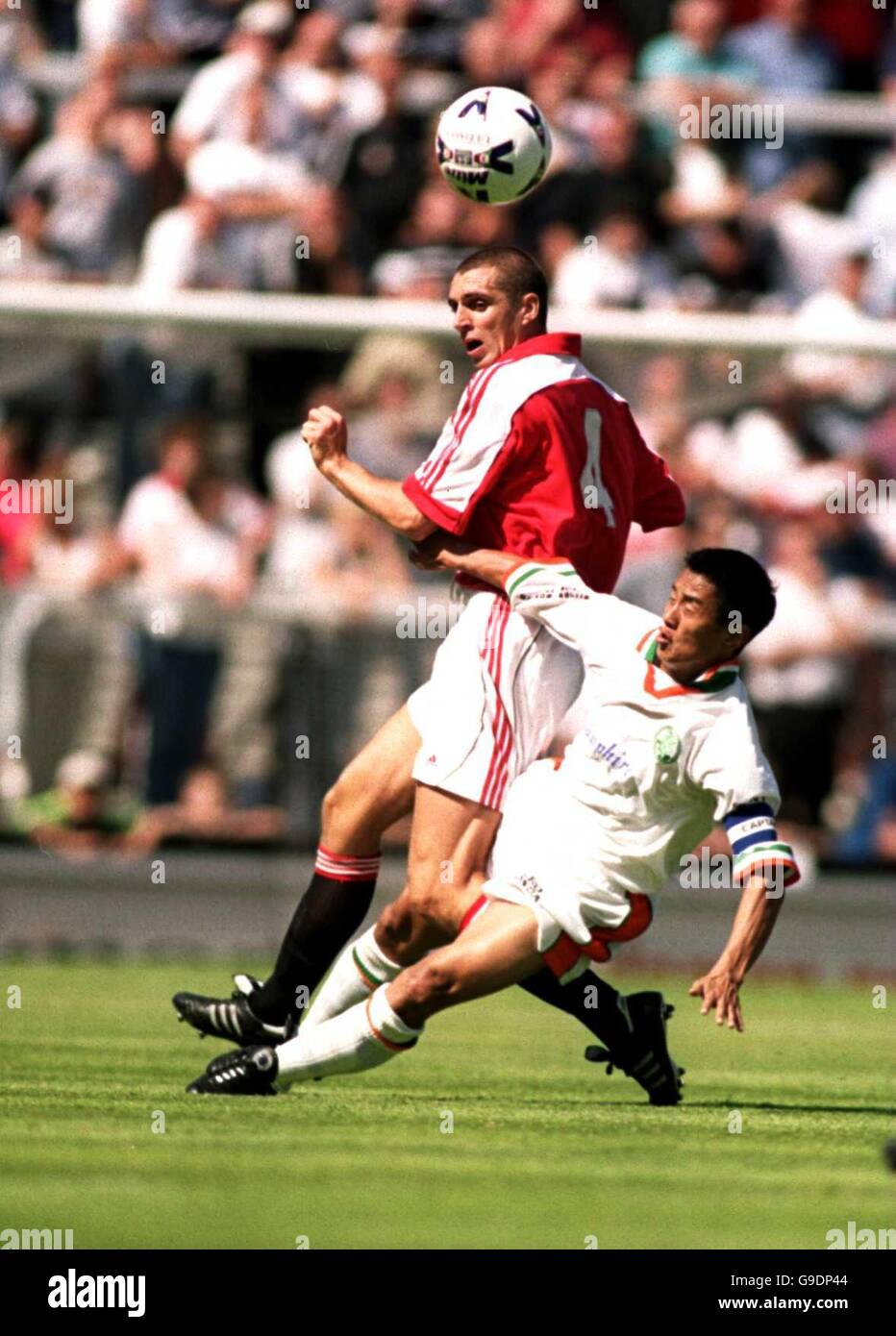 Soccer - Friendly - Fulham v India. India's Baichung Bhutia (r) dives in for a tackle on Fulham's Andy Melville (l) Stock Photo
