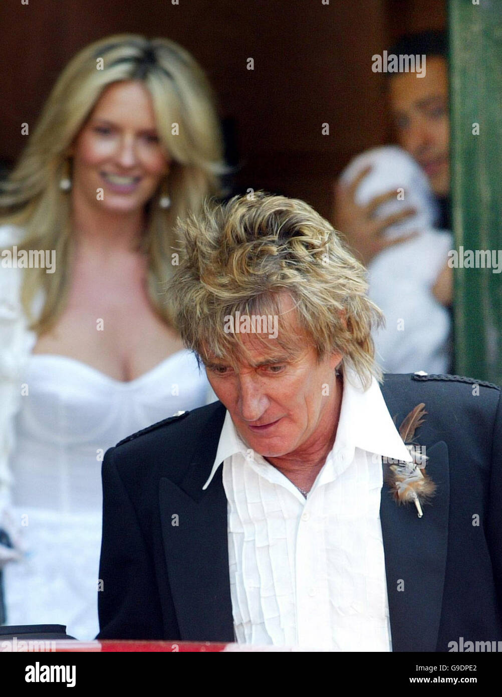 Rockstar Rod Stewart and his partner Penny Lancaster leave South Leith Parish Church in Edinburgh after the Christening of their son Alastair Wallace Stewart. Stock Photo