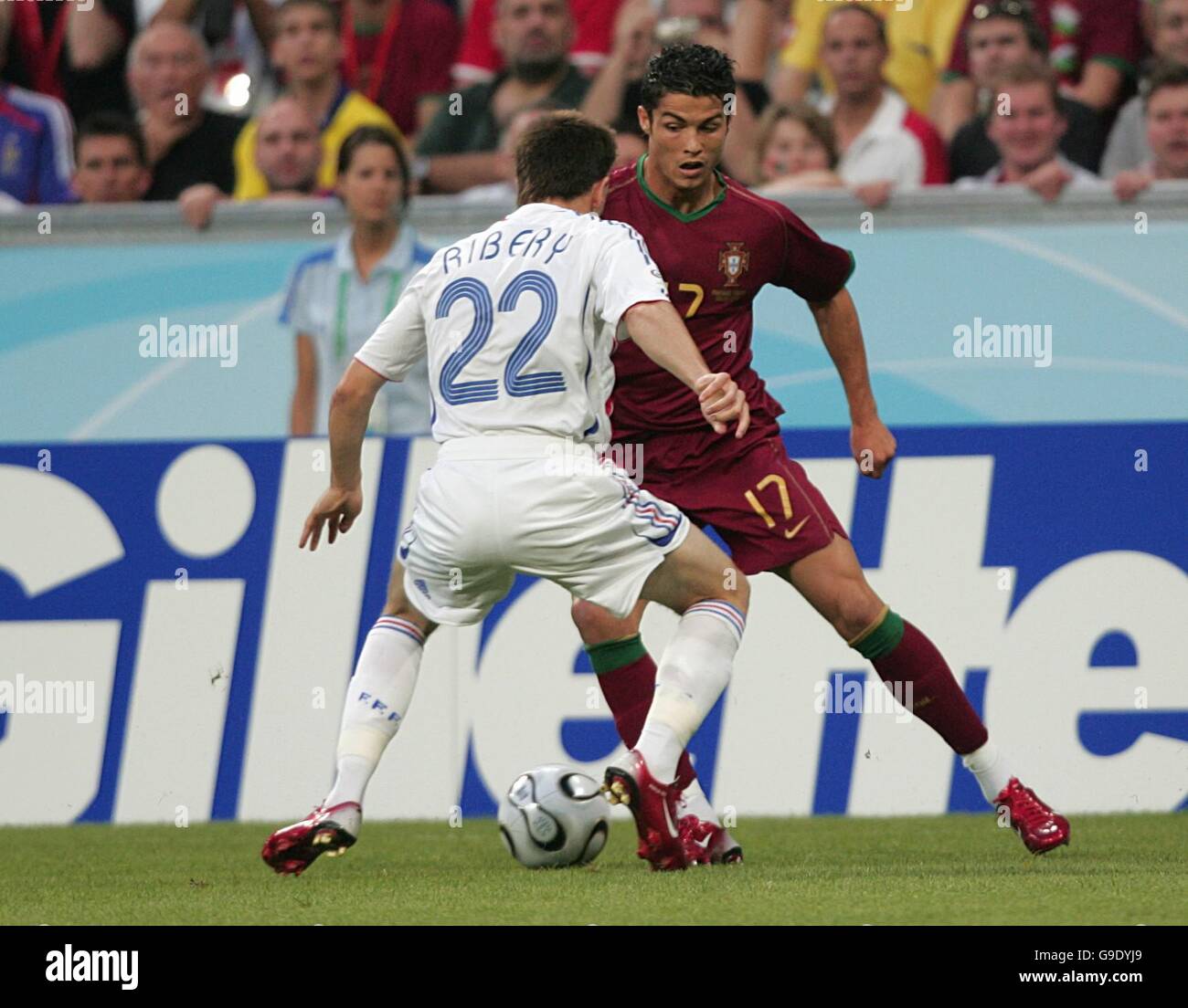 Soccer - 2006 FIFA World Cup Germany - Semi Final - Portugal v France - Allianz Arena. France's Franck Ribery challenges Portugal's Cristiano Ronaldo Stock Photo