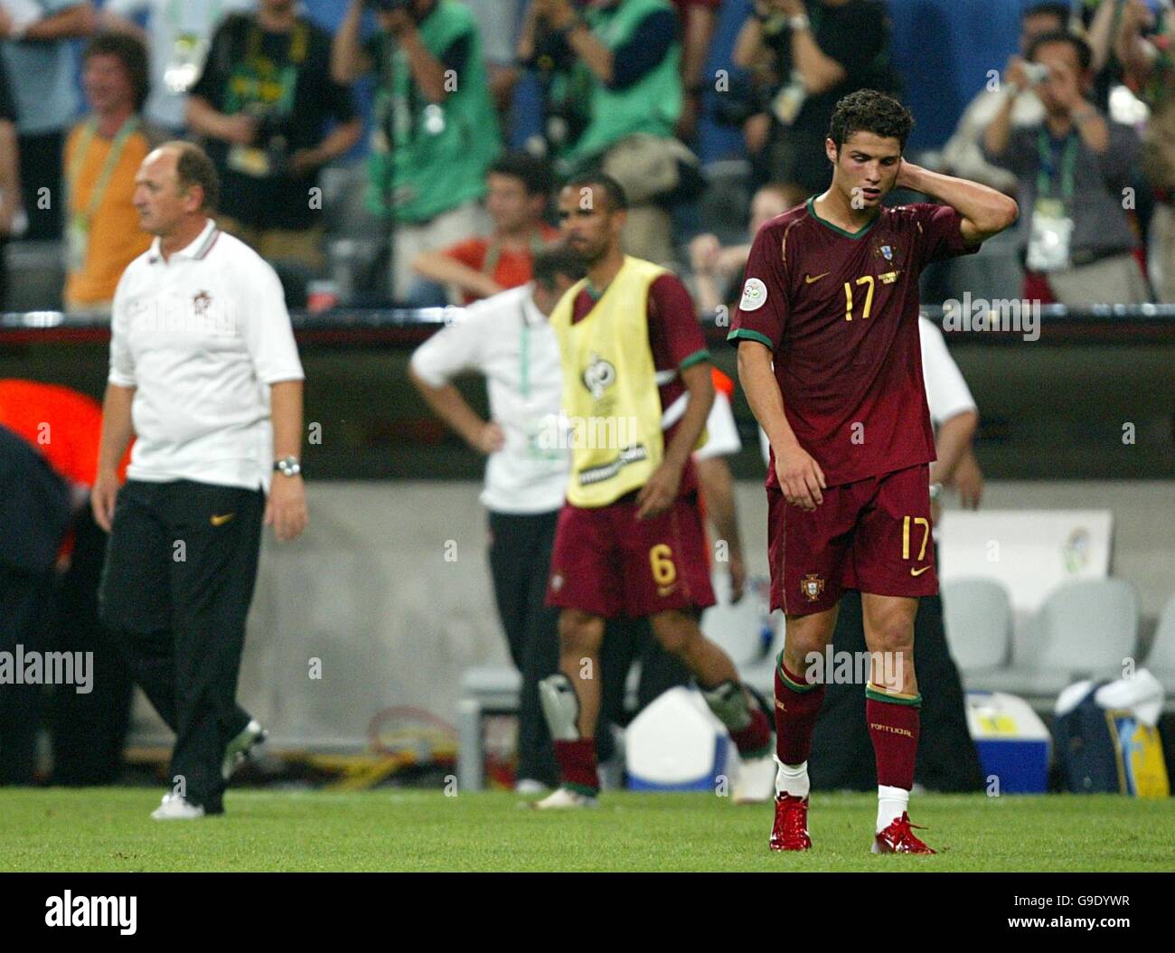 Portugal coach Luiz Felipe Scolari stands dejected with Cristiano Ronaldo Stock Photo