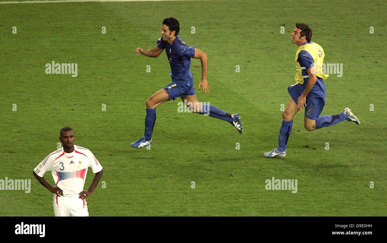 Italy's Fabio Grosso (c) celebrates after scoring the winning penalty Stock Photo