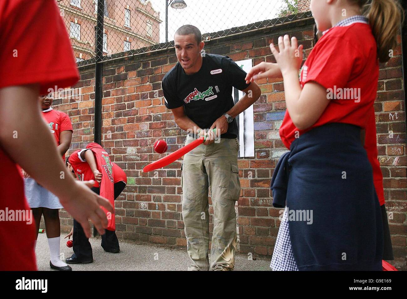England cricketer Kevin Pietersen plays cricket with children from Christchurch Bentinek Primary School in central London. Stock Photo