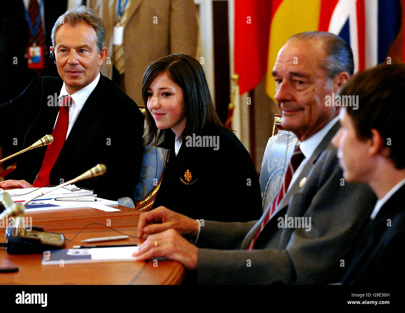 Sophie Harrison from Caedmon School, Whitby, North Yorkshire, sits with Britain's Prime Minister Tony Blair and the other G8 world leaders including French President Jacques Chirac at a session of the J8 in St Petersburg, Russia. Stock Photo