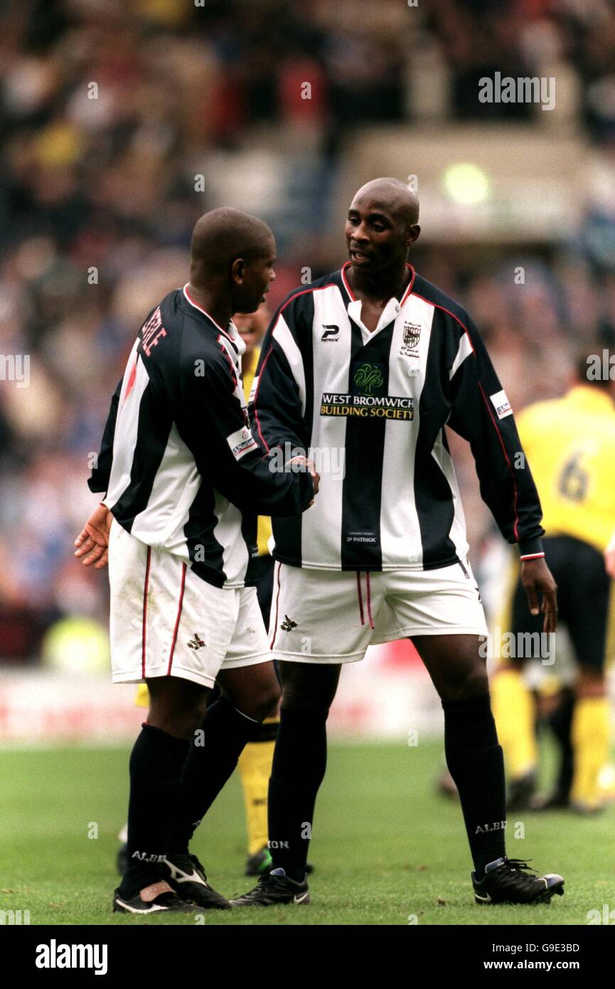 West Bromwich Albion's Des Lyttle (l) shakes hands with teammate Jason Roberts (r) at the end of the game Stock Photo