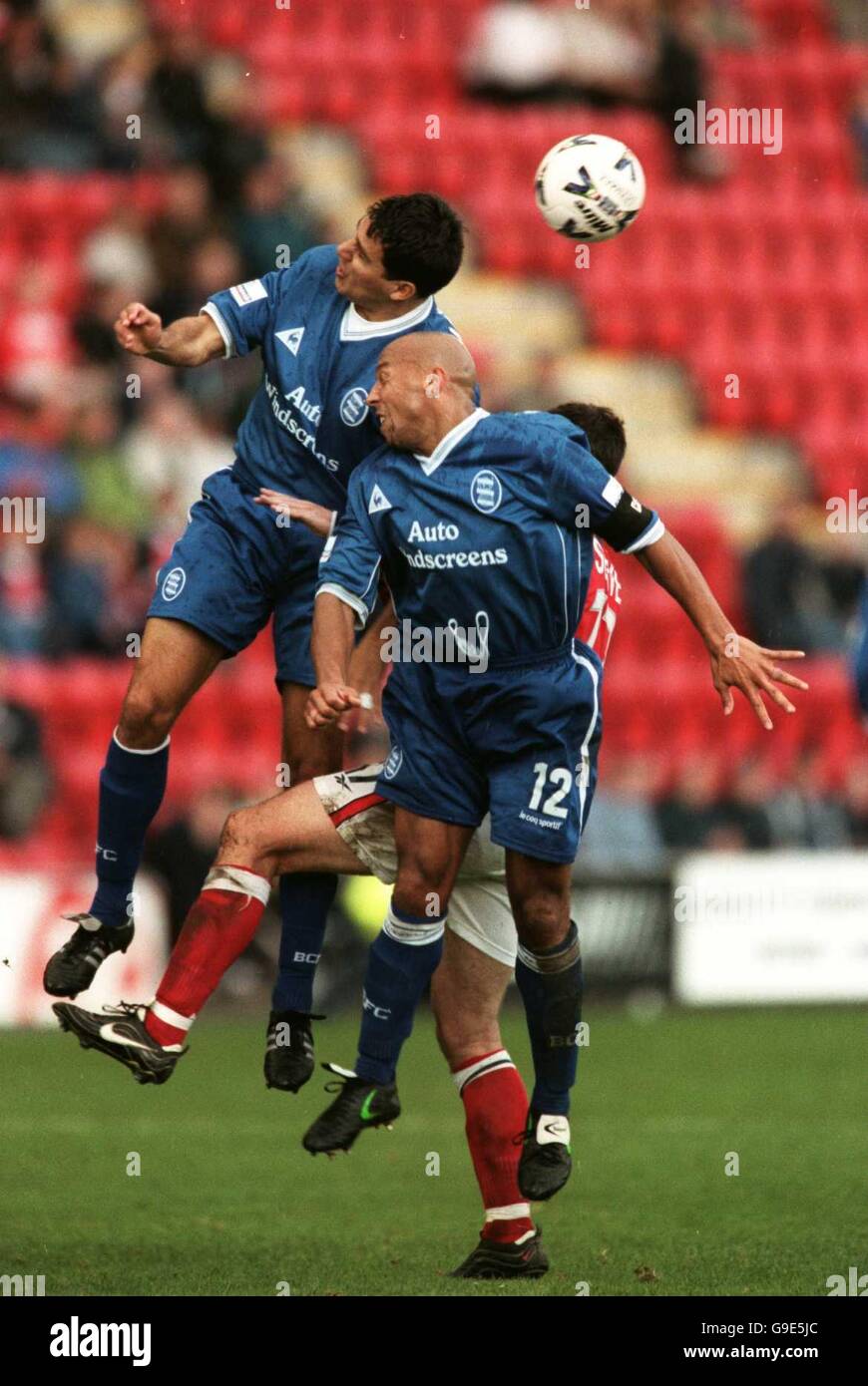 Birmingham City's Martin O' Connor (r) and Stan Lazaridis (l) block out Crewe Alexandra's Neil Sorvel (hidden) Stock Photo