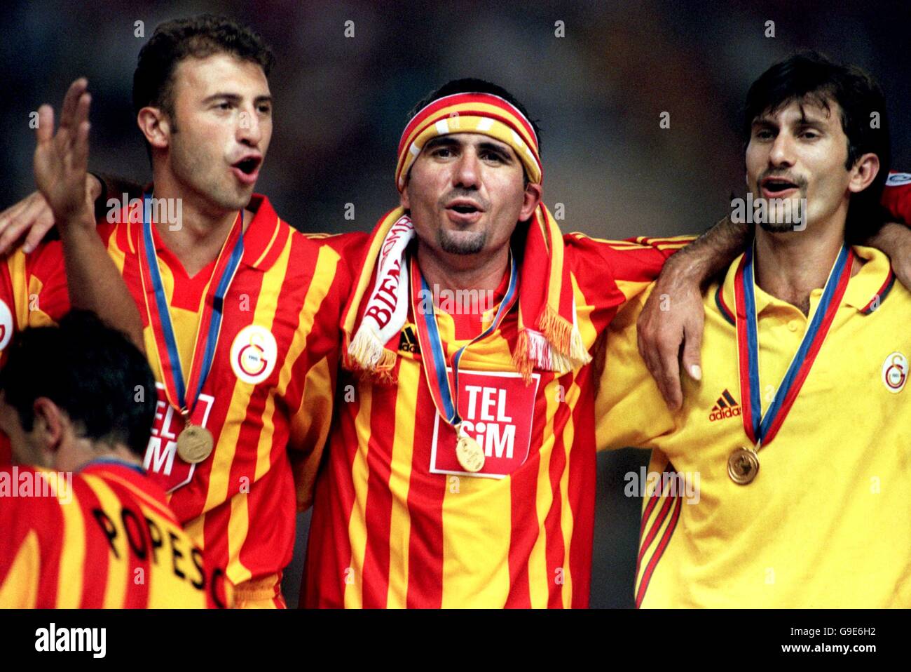 Galatasaray's Gheorghe Hagi (c) and Akyel Fatih (l) celebrate winning the  UEFA Super Cup Stock Photo - Alamy
