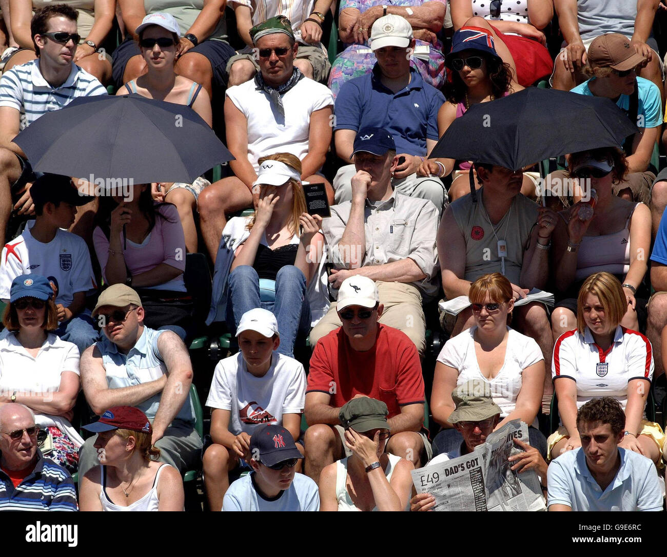Watching tennis match hi-res stock photography and images