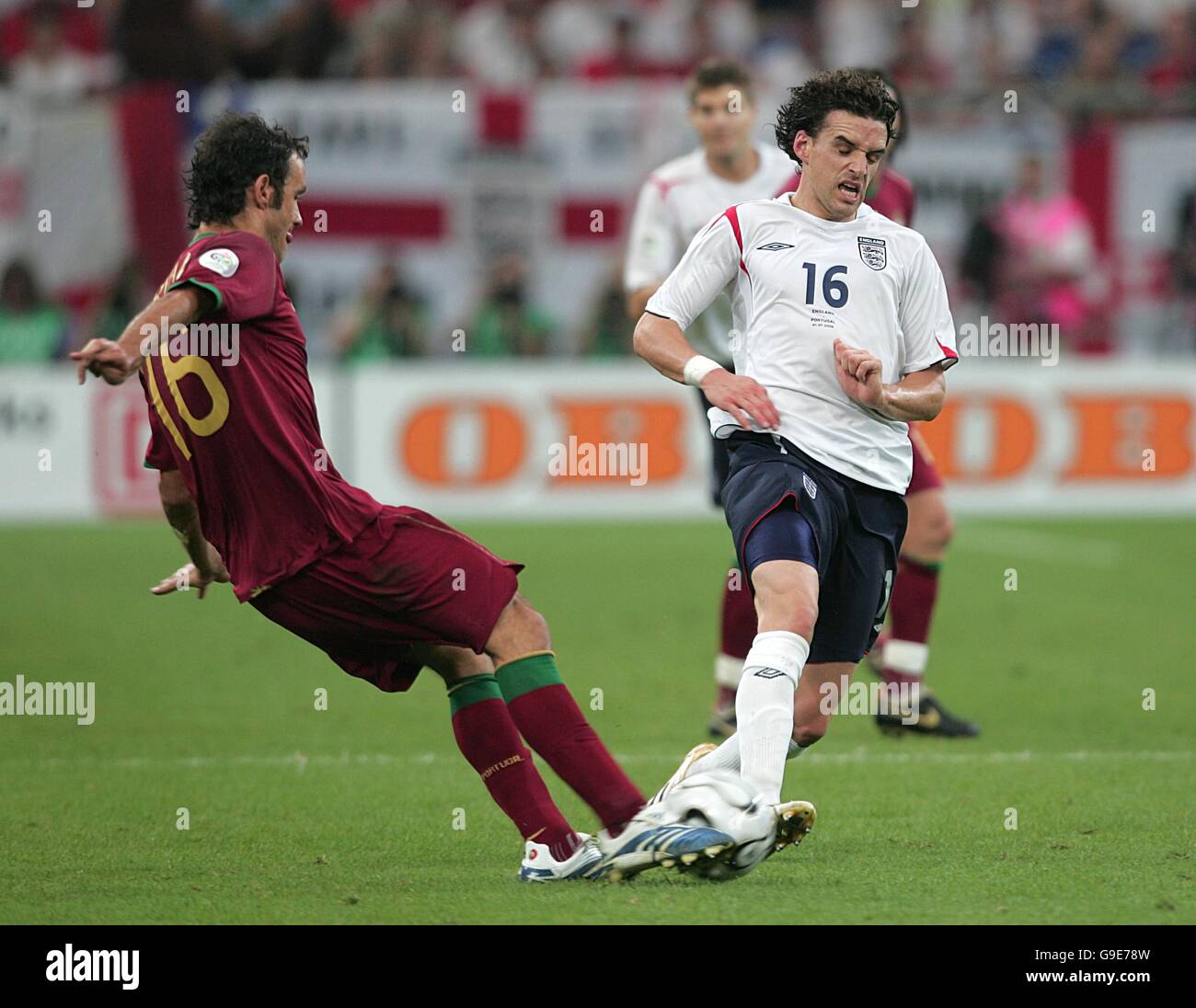 Soccer - 2006 FIFA World Cup Germany - Quarter Final - England v Portugal - AufSchalke Arena. Owen Hargreaves, England and Alberto Ricardo Carvalho, Portugal battle for the ball Stock Photo