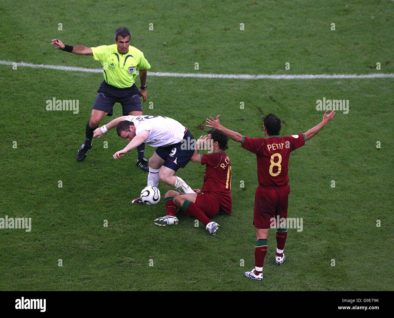 Soccer - 2006 FIFA World Cup Germany - Quarter Final - England v Portugal - AufSchalke Arena. England's Wayne Rooney stamps on Portugal's Alberto Ricardo Carvalho Stock Photo