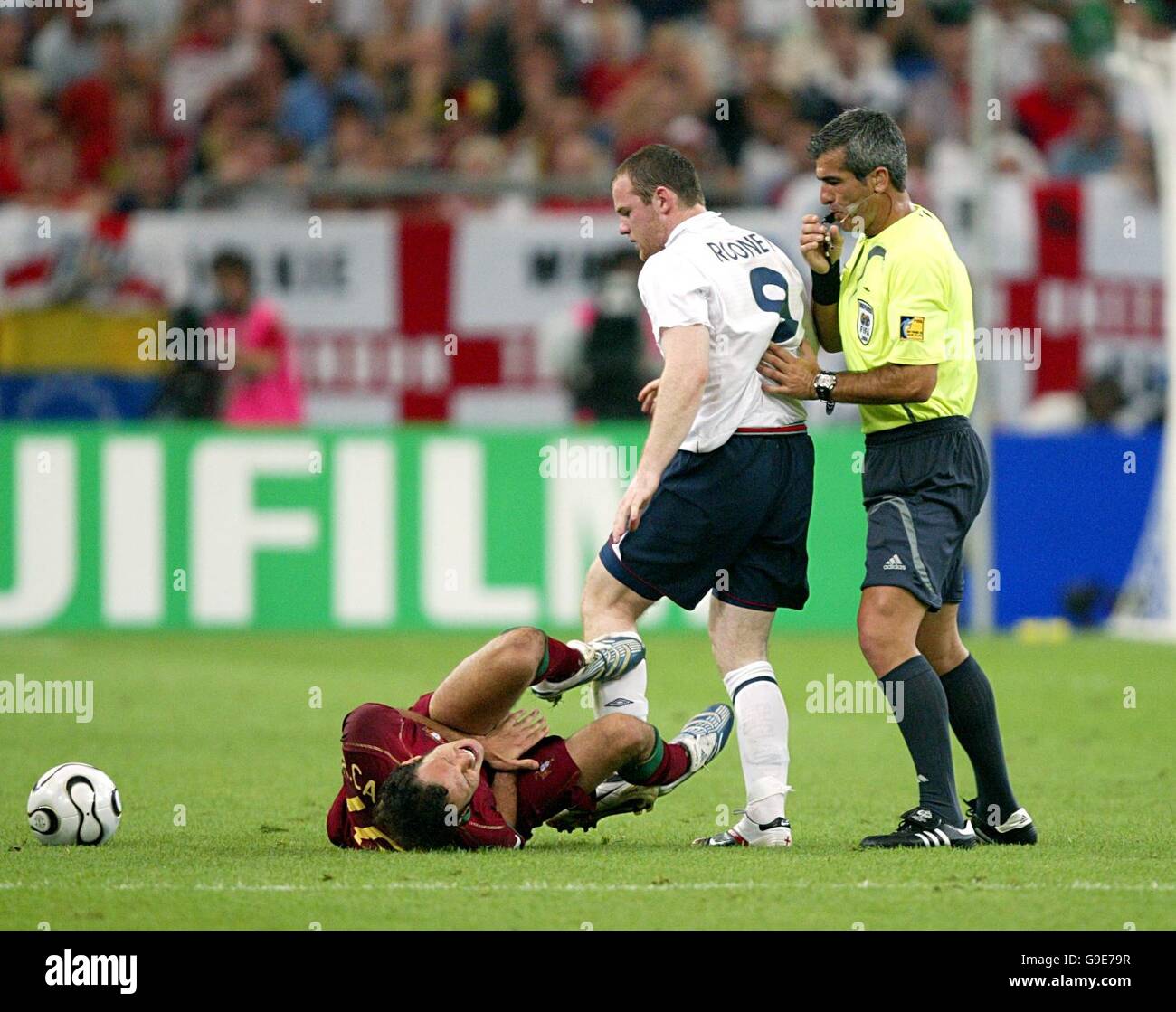 Soccer - 2006 FIFA World Cup Germany - Quarter Final - England v Portugal - AufSchalke Arena. England's Wayne Rooney stamps on Portugal's Alberto Ricardo Carvalho leading to his sending off Stock Photo