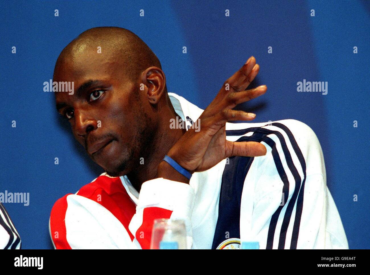 USA star Kevin Garnett chats to teammates during a press conference Stock Photo