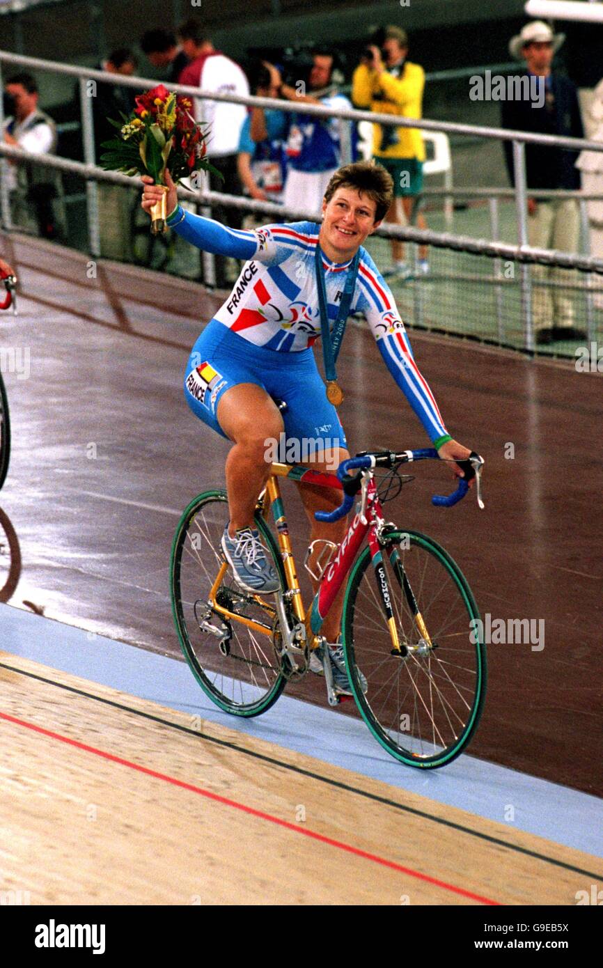 France's Gold medallist Felicia Ballanger celebrates her win Stock Photo