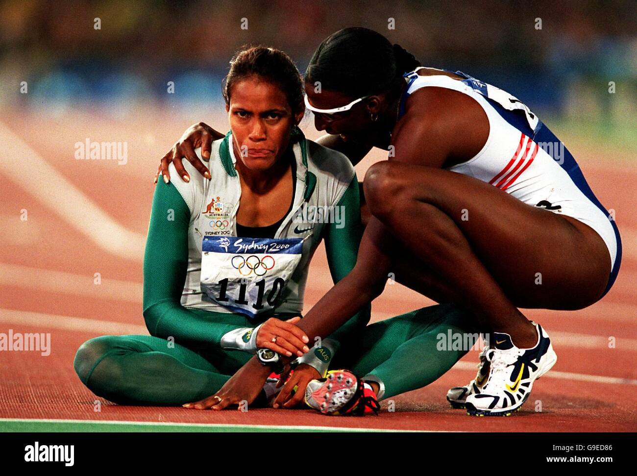 Australia's gold medal winner Cathy Freeman (L) is congratulated by Great Britain's Donna Fraser Stock Photo