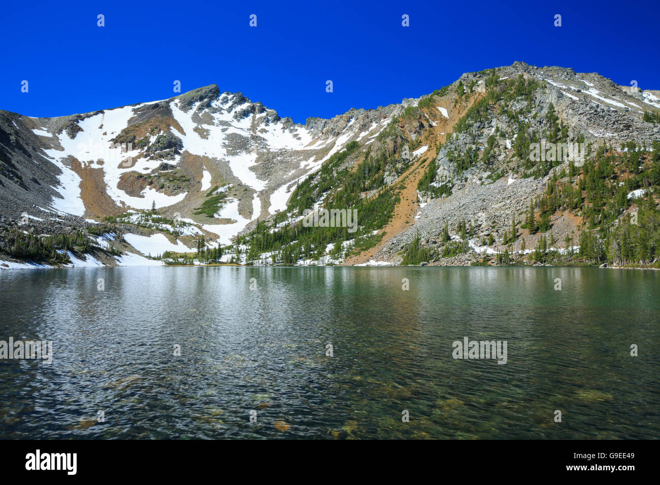 louise lake below middle mountain in the tobacco root range near